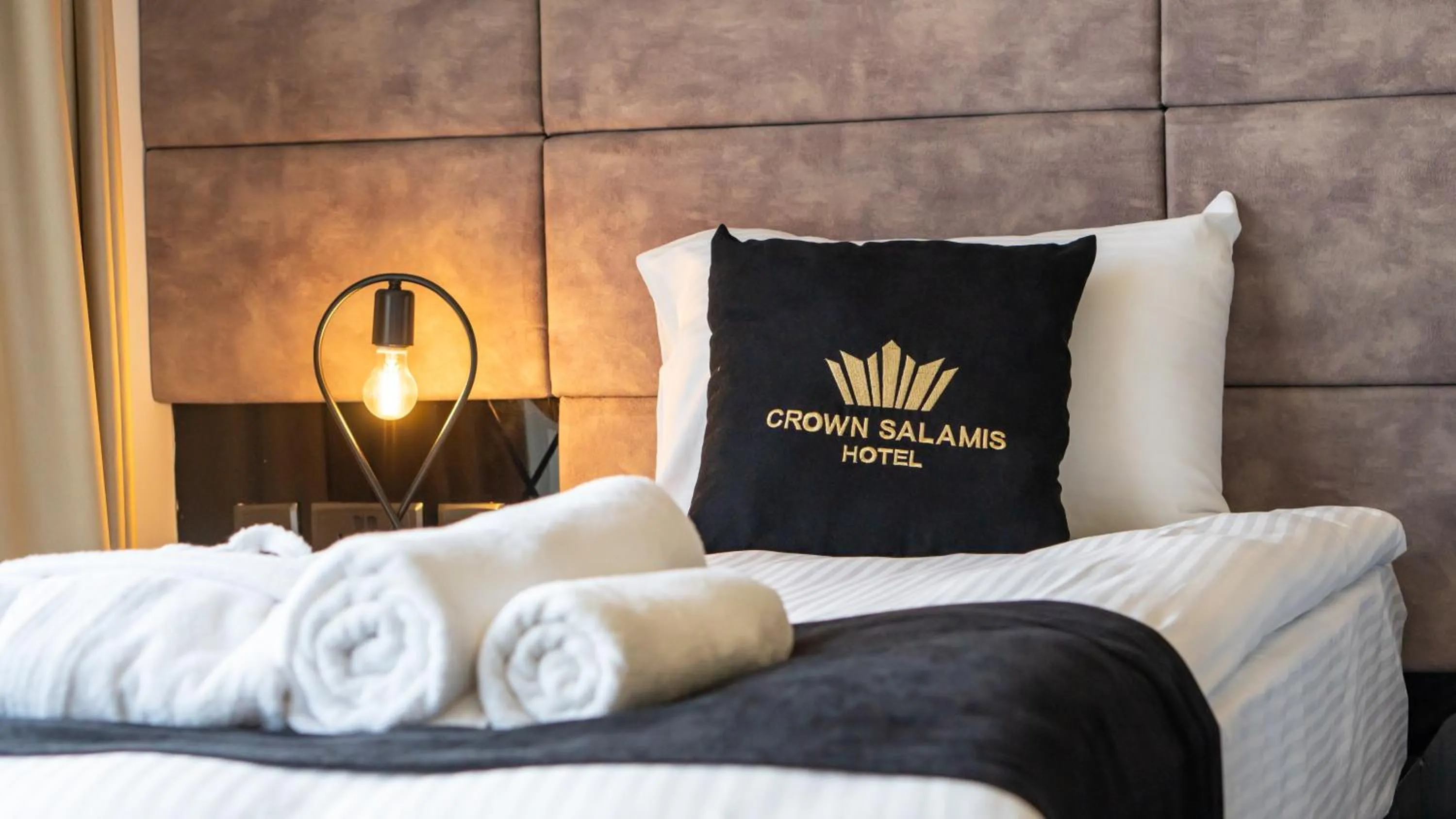 towels, Bed in Crown Salamis Hotel