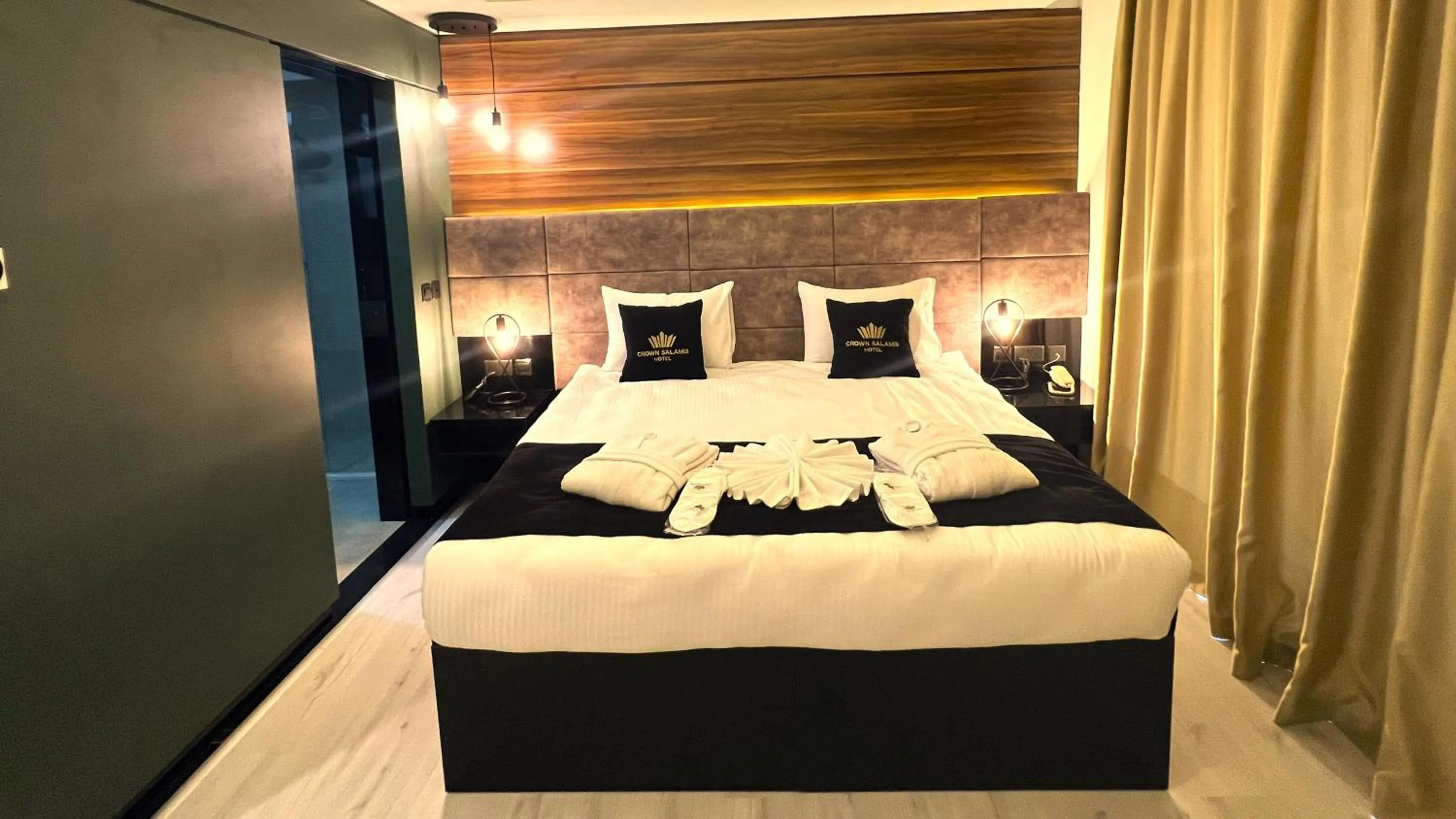 Bed in Crown Salamis Hotel