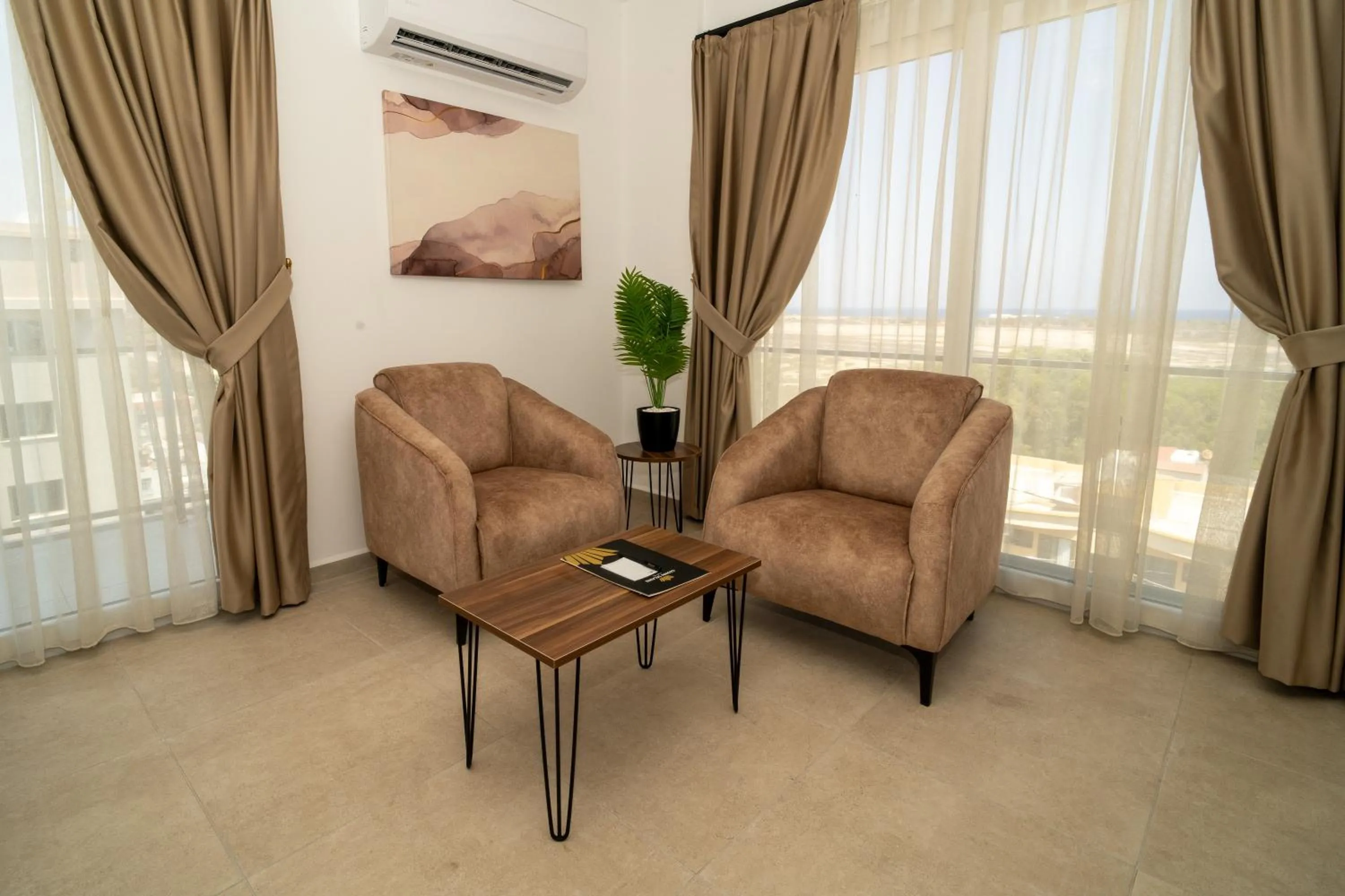 Living room in Crown Salamis Hotel