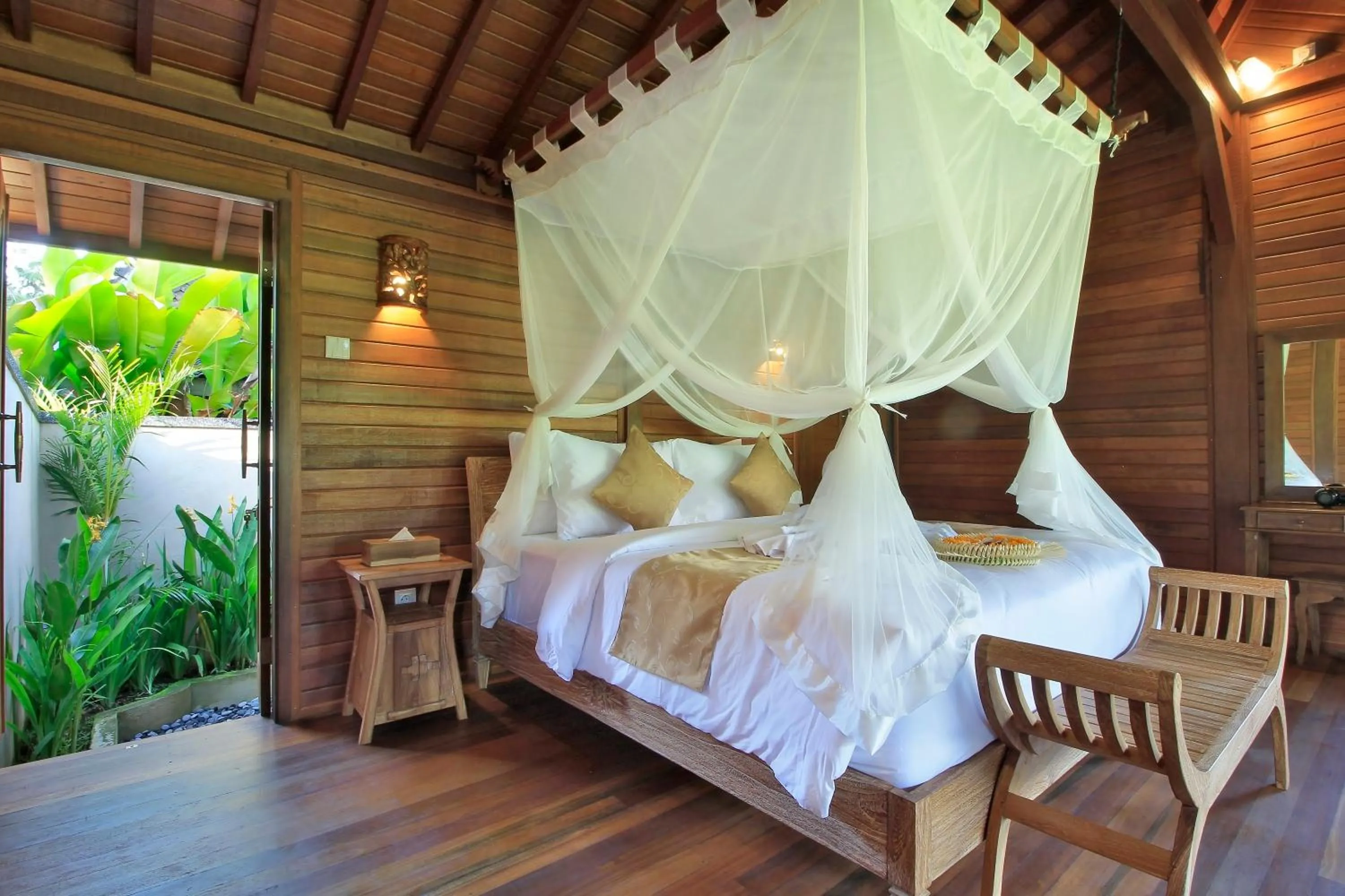 Bed in Hanaya Ubud Villa