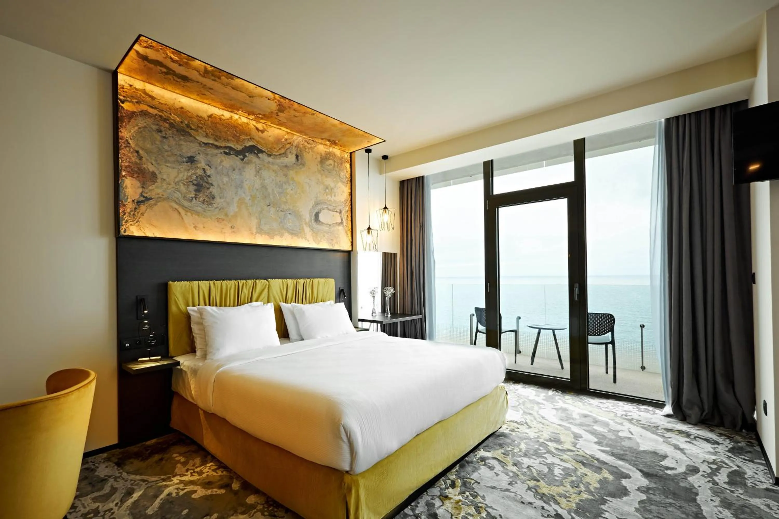 Bed in Miramare Magnetic Beach Hotel