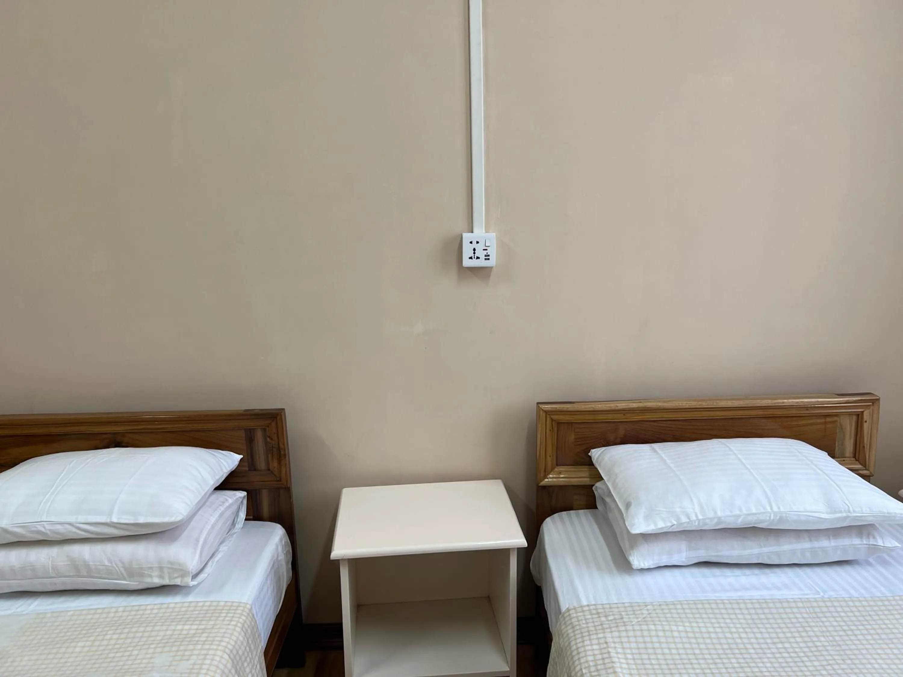 Bed in Hotel Dinthar Zara