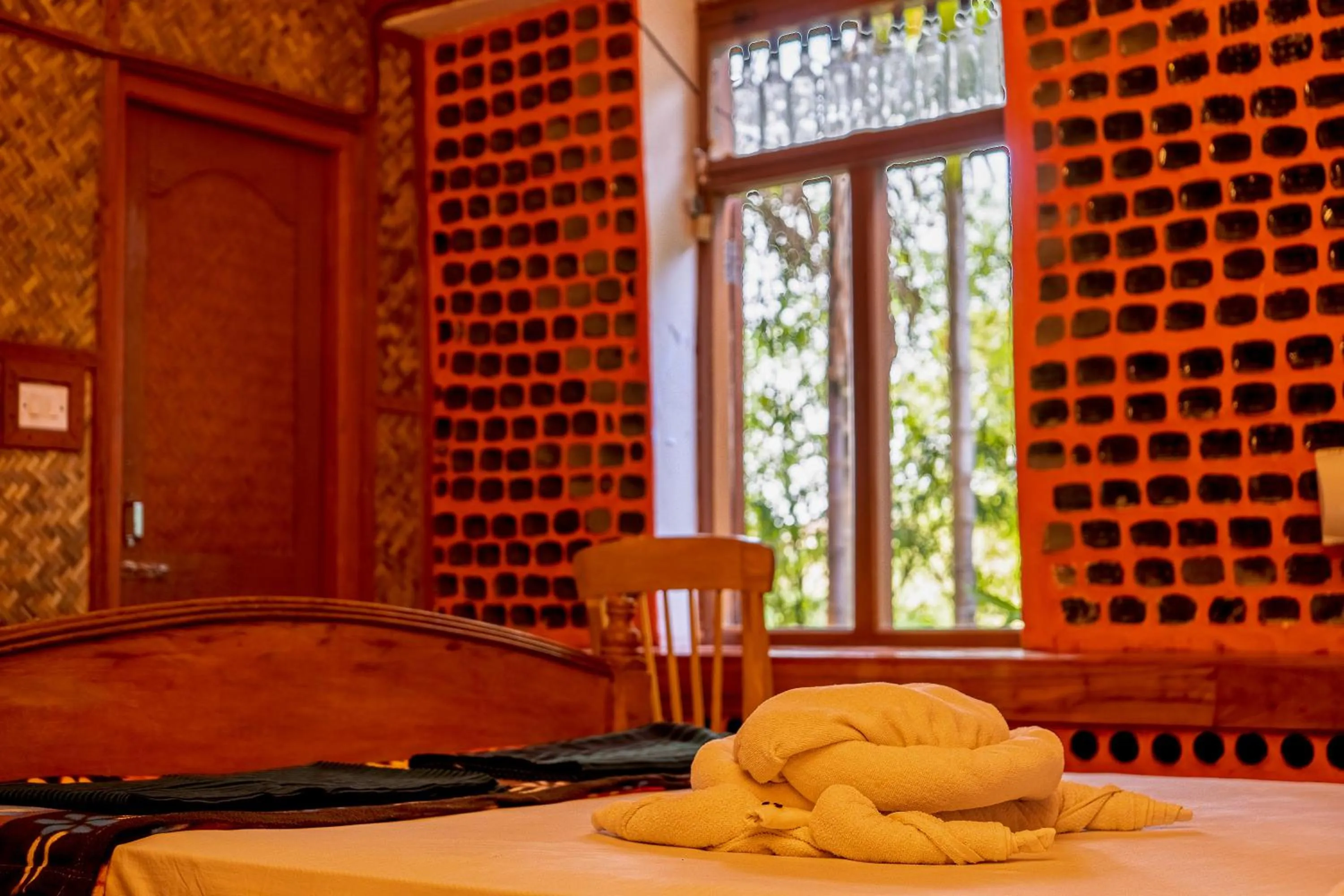 Staff, Bed in Palm Grove Eco Resort