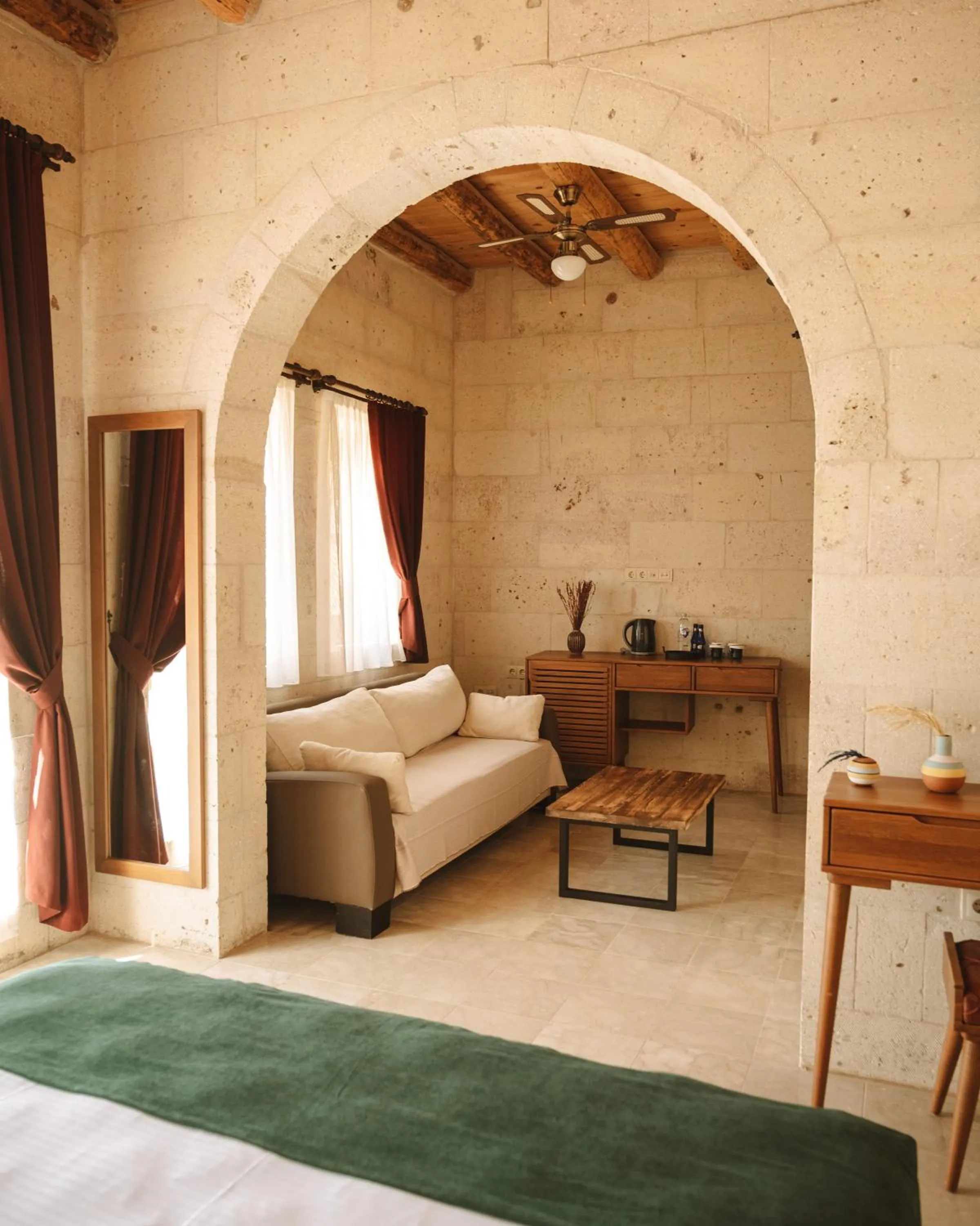 Seating area, Bed in Juno Cappadocia