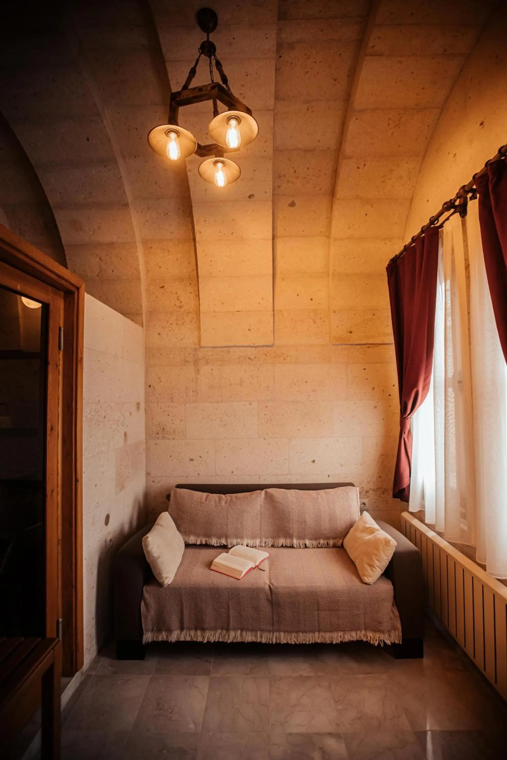 Seating area, Bed in Juno Cappadocia