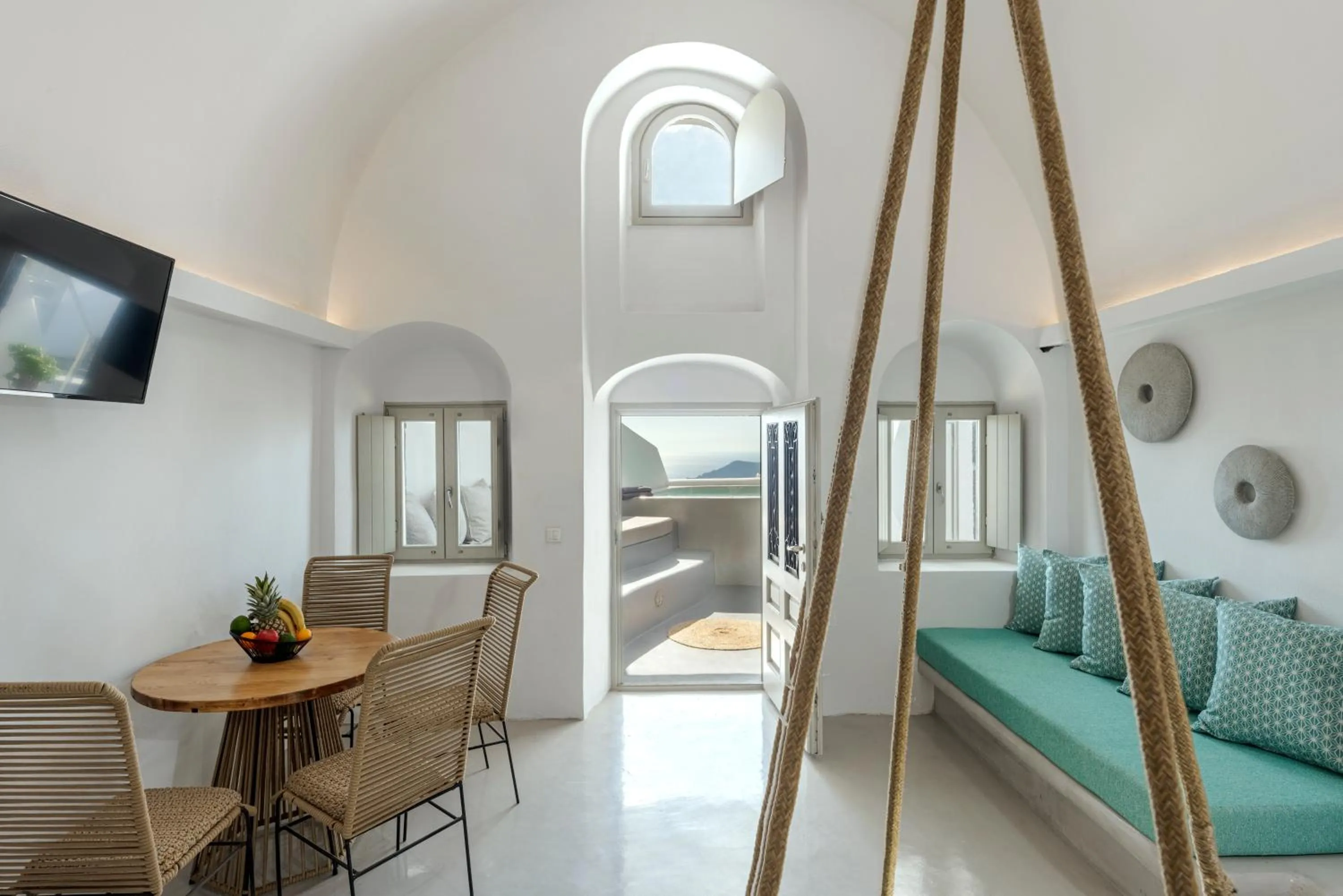 Seating area in Kaleidoscope Imerovigli Suites