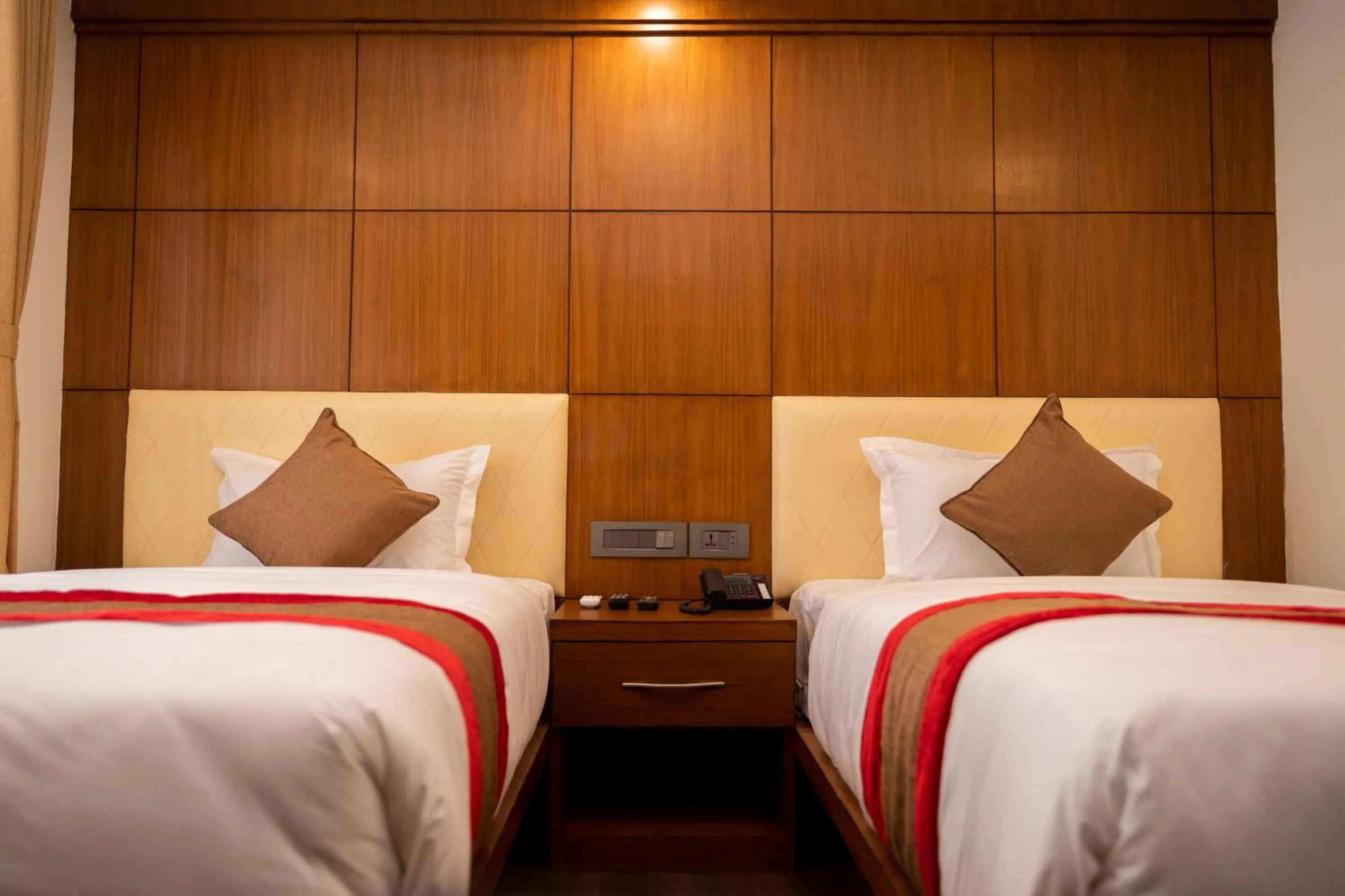 Bed in Hotel Kailash Kutee