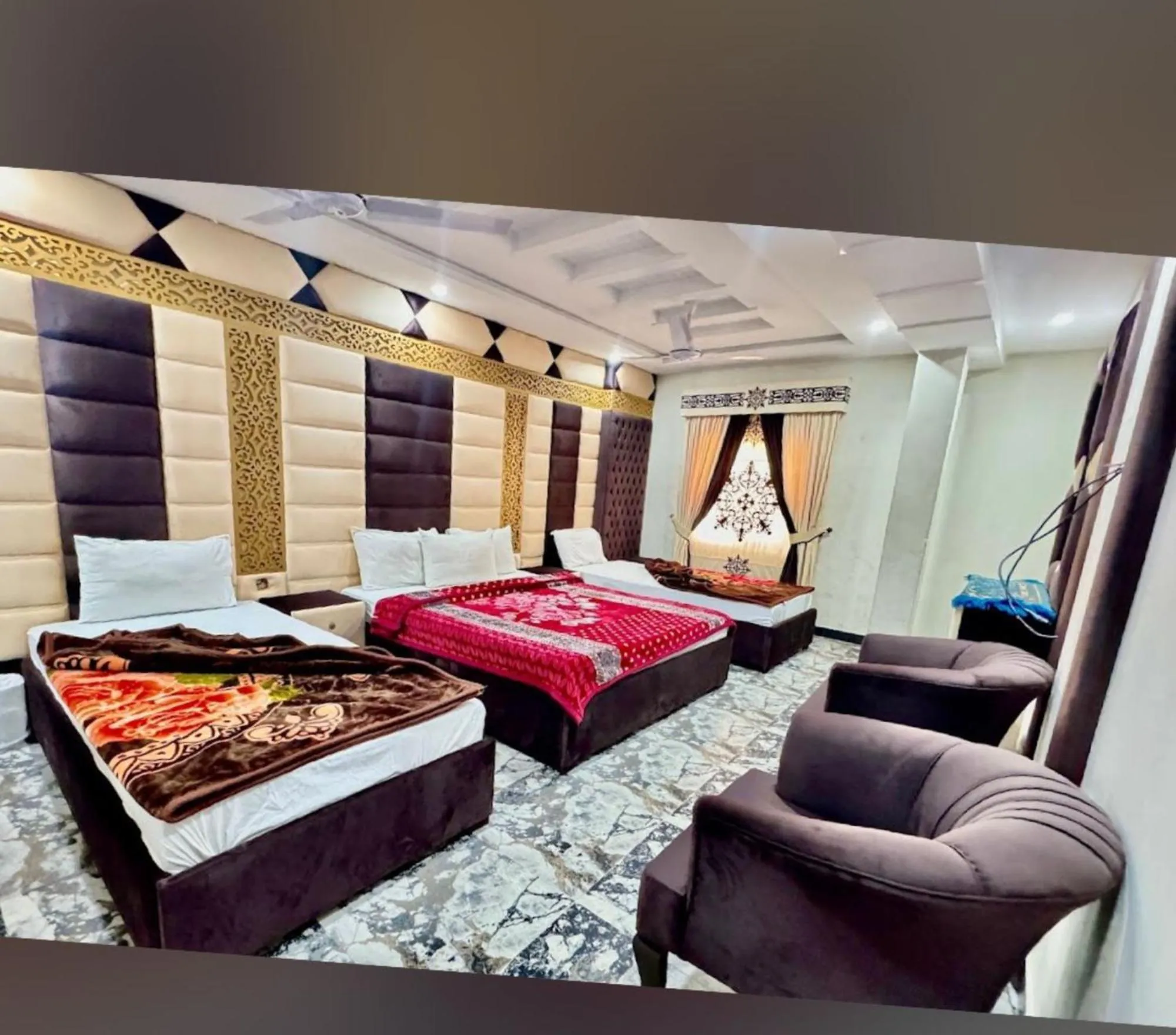 Communal lounge/ TV room in Royal Blue inn Hotel