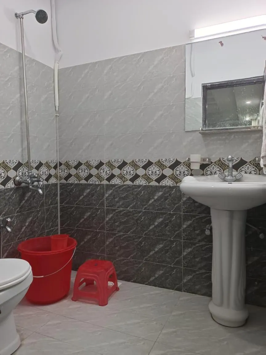 Bathroom in Royal Blue inn Hotel