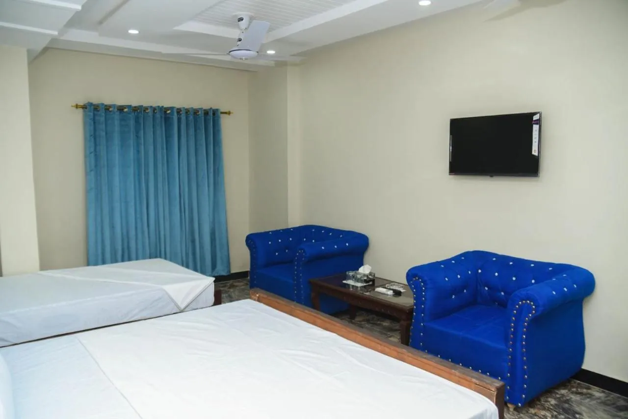 Bedroom in Royal Blue inn Hotel