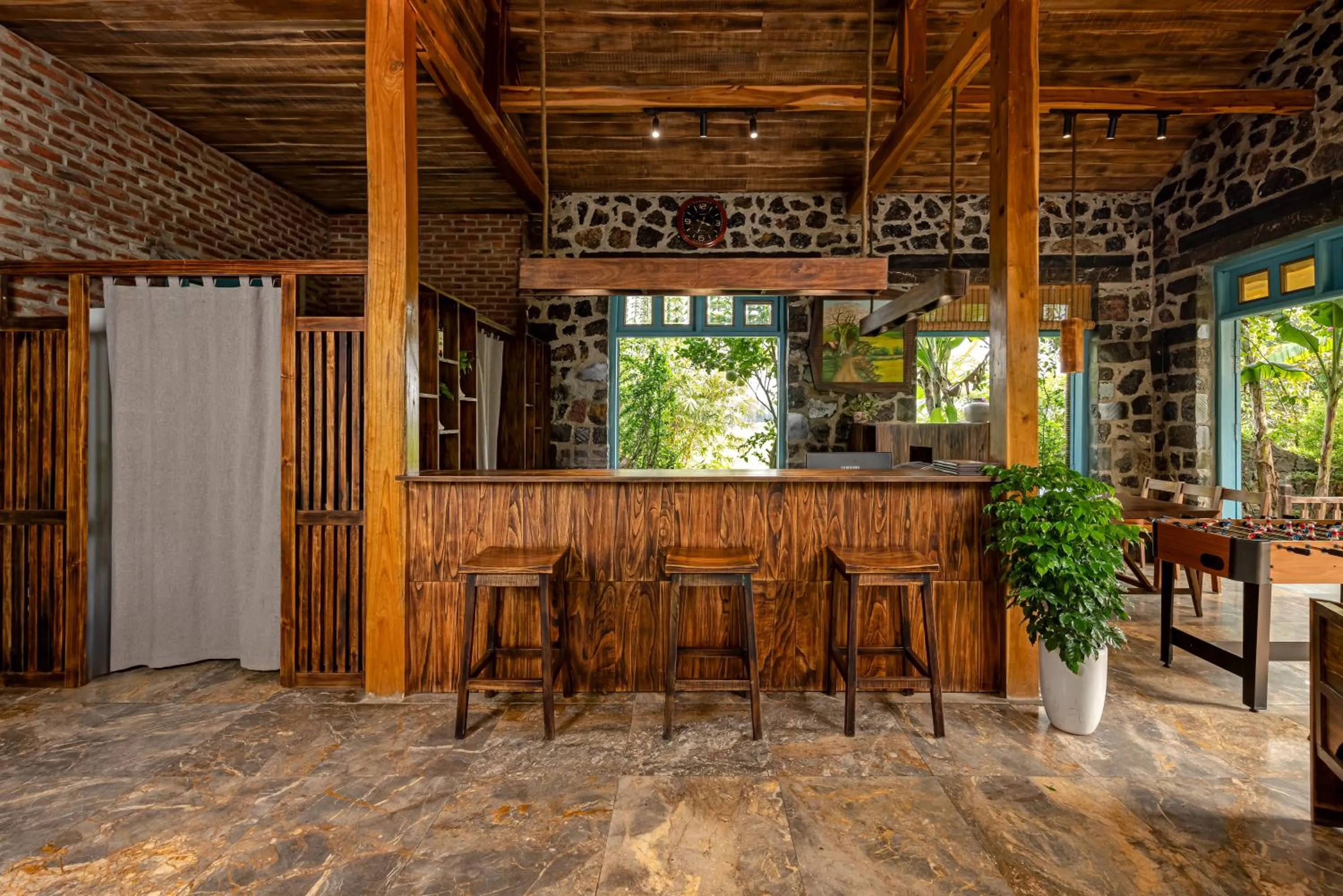 Communal lounge/ TV room in ChezCao Rice Field Ecolodge Ninh Binh