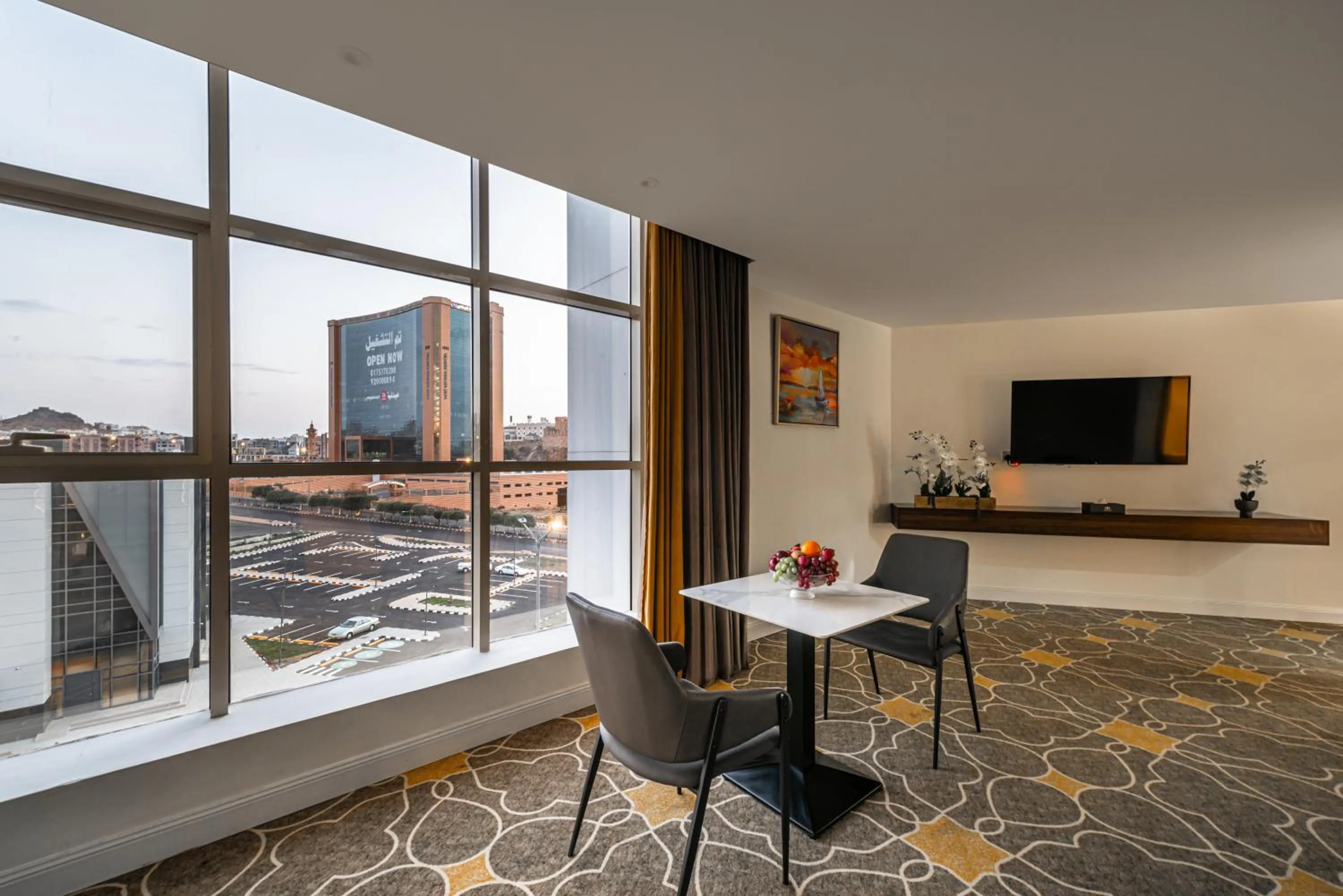 Communal lounge/ TV room in Abha Gardn Millennium Hotel