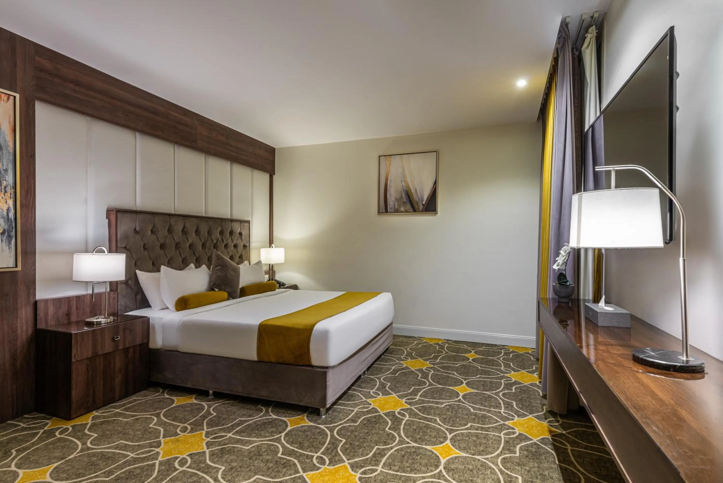 Photo of the whole room, Bed in Abha Gardn Millennium Hotel