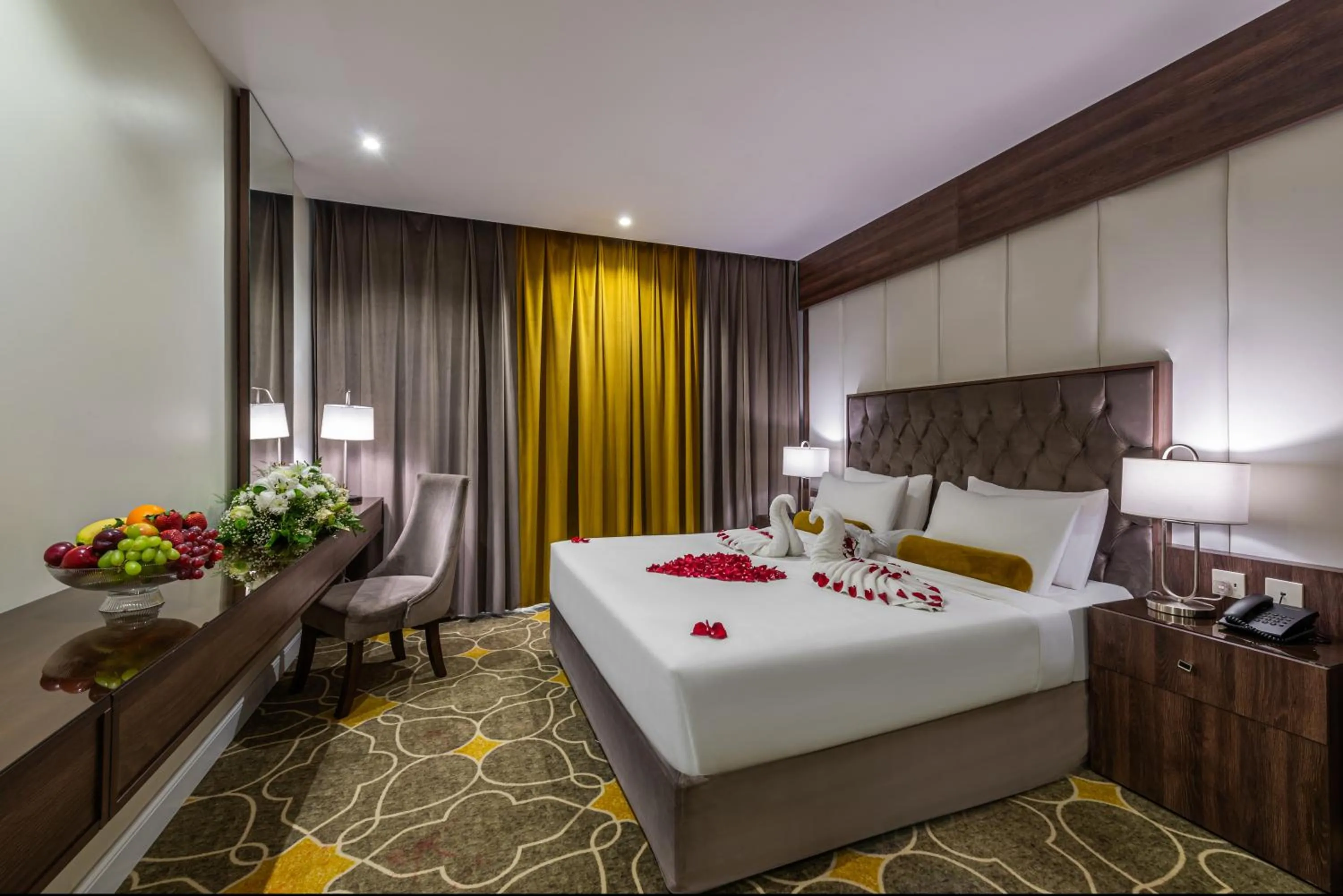 Bed in Abha Gardn Millennium Hotel