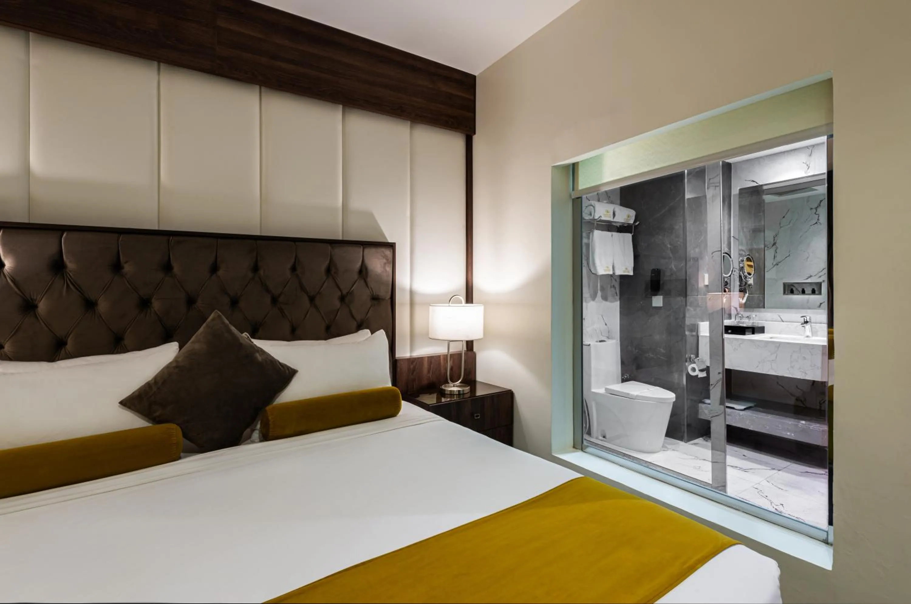 Bed in Abha Gardn Millennium Hotel