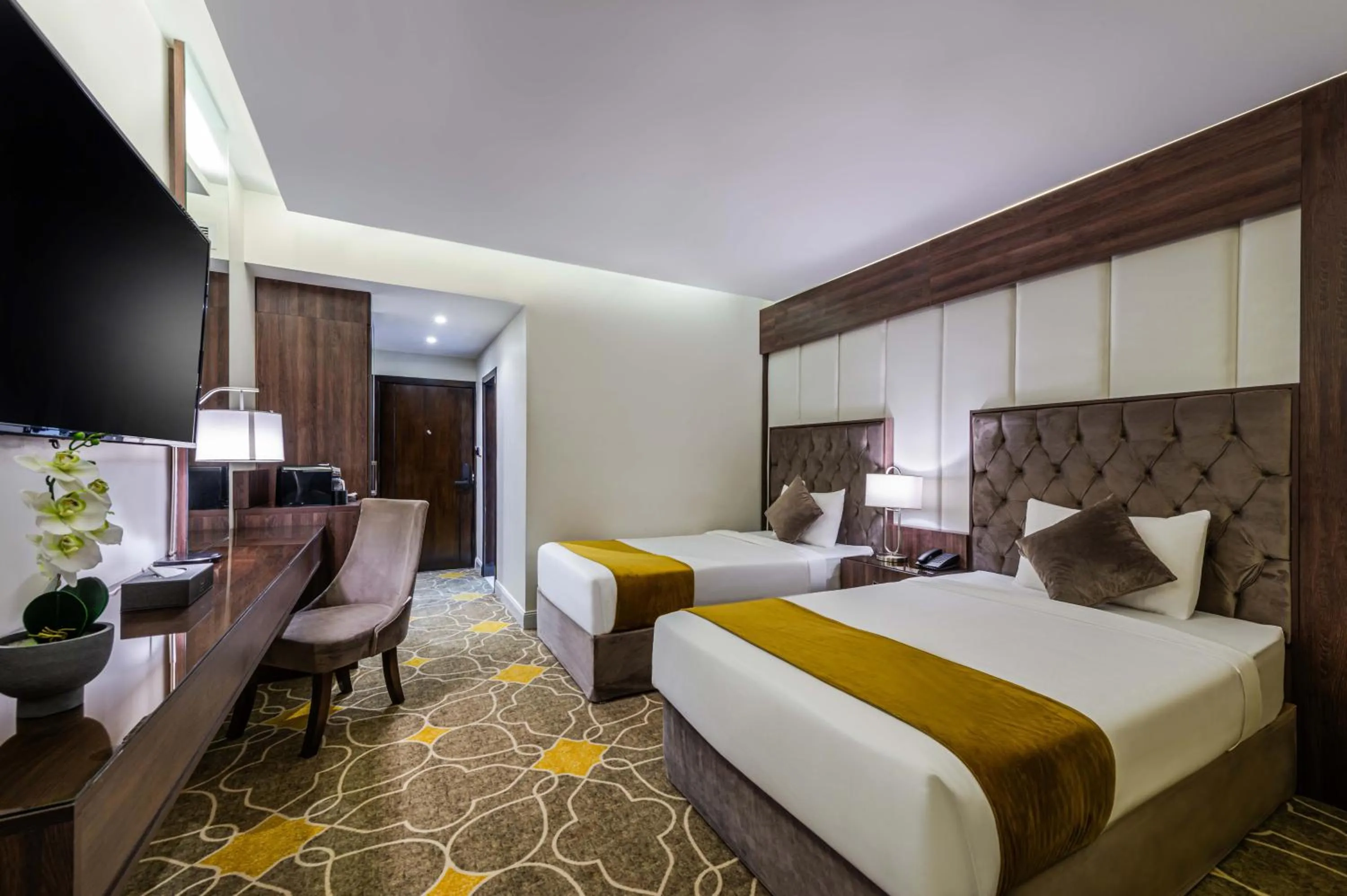 Bed in Abha Gardn Millennium Hotel