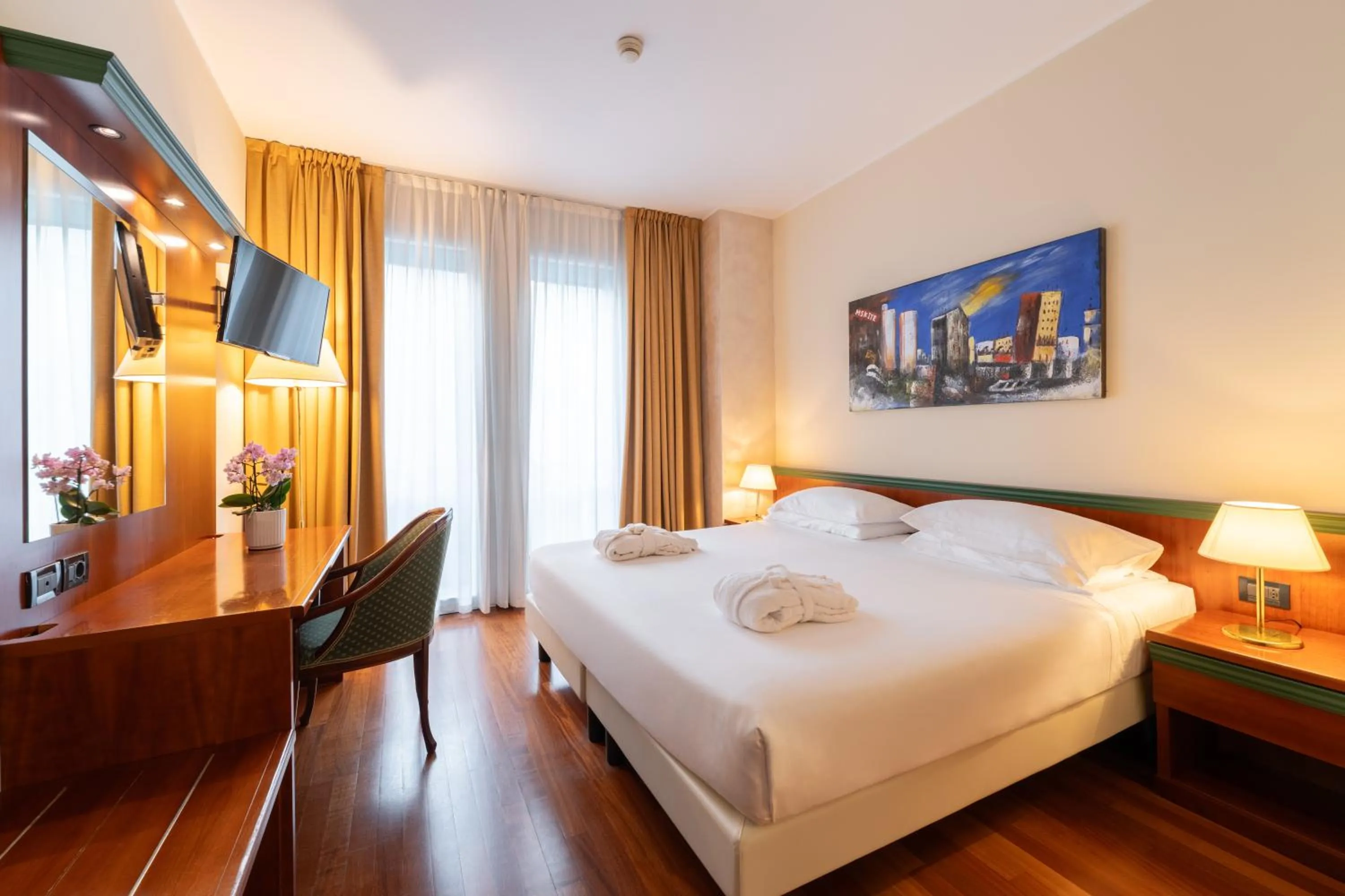 Bed in Hotel Raffaello