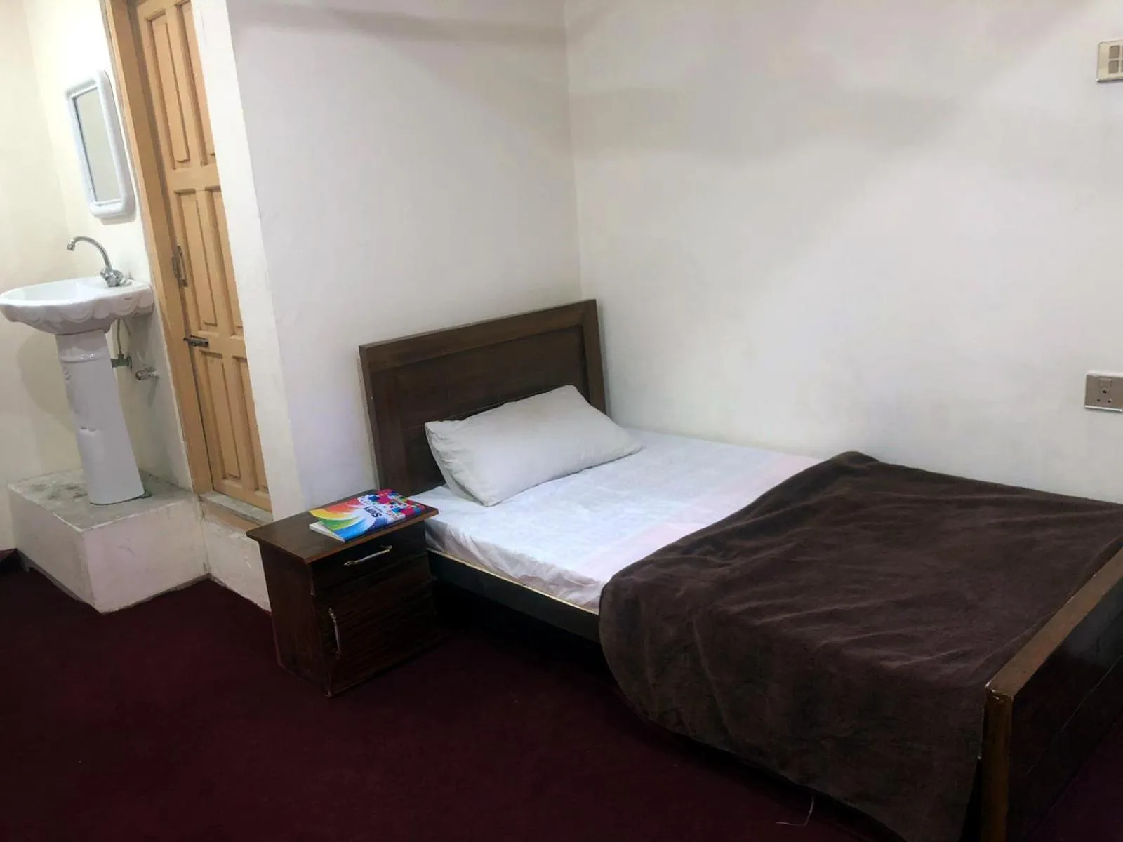 Bed in Highlander inn Skardu