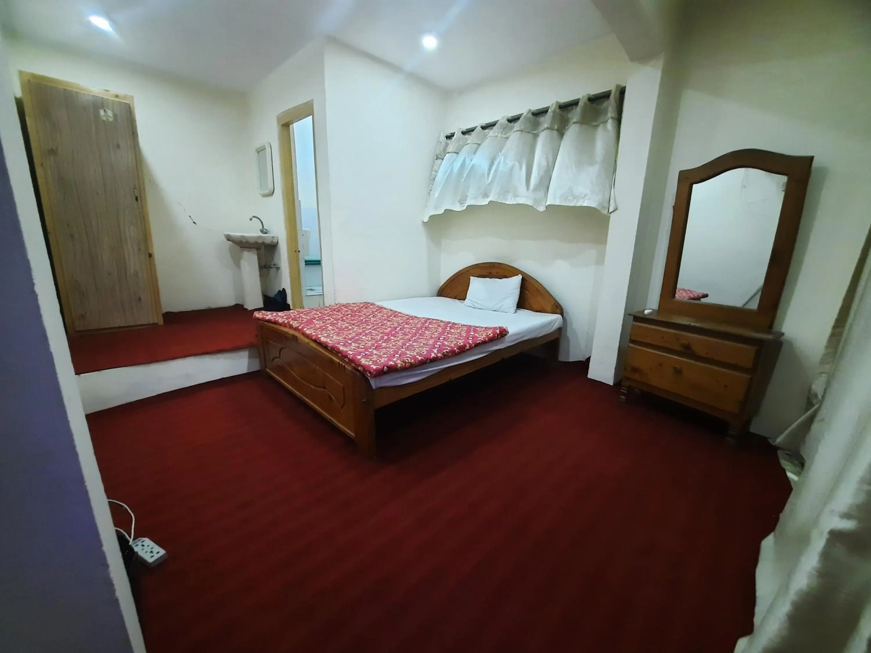 Bed in Highlander inn Skardu