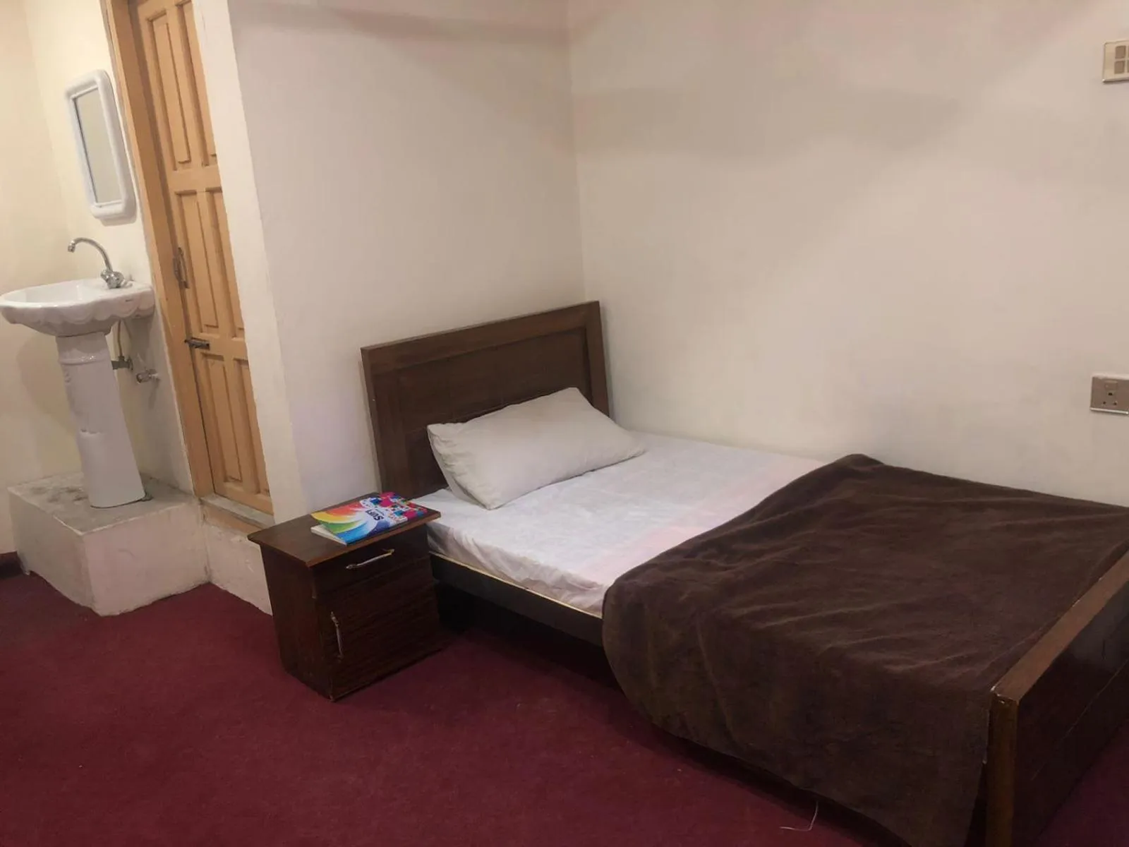 Bed in Highlander inn Skardu