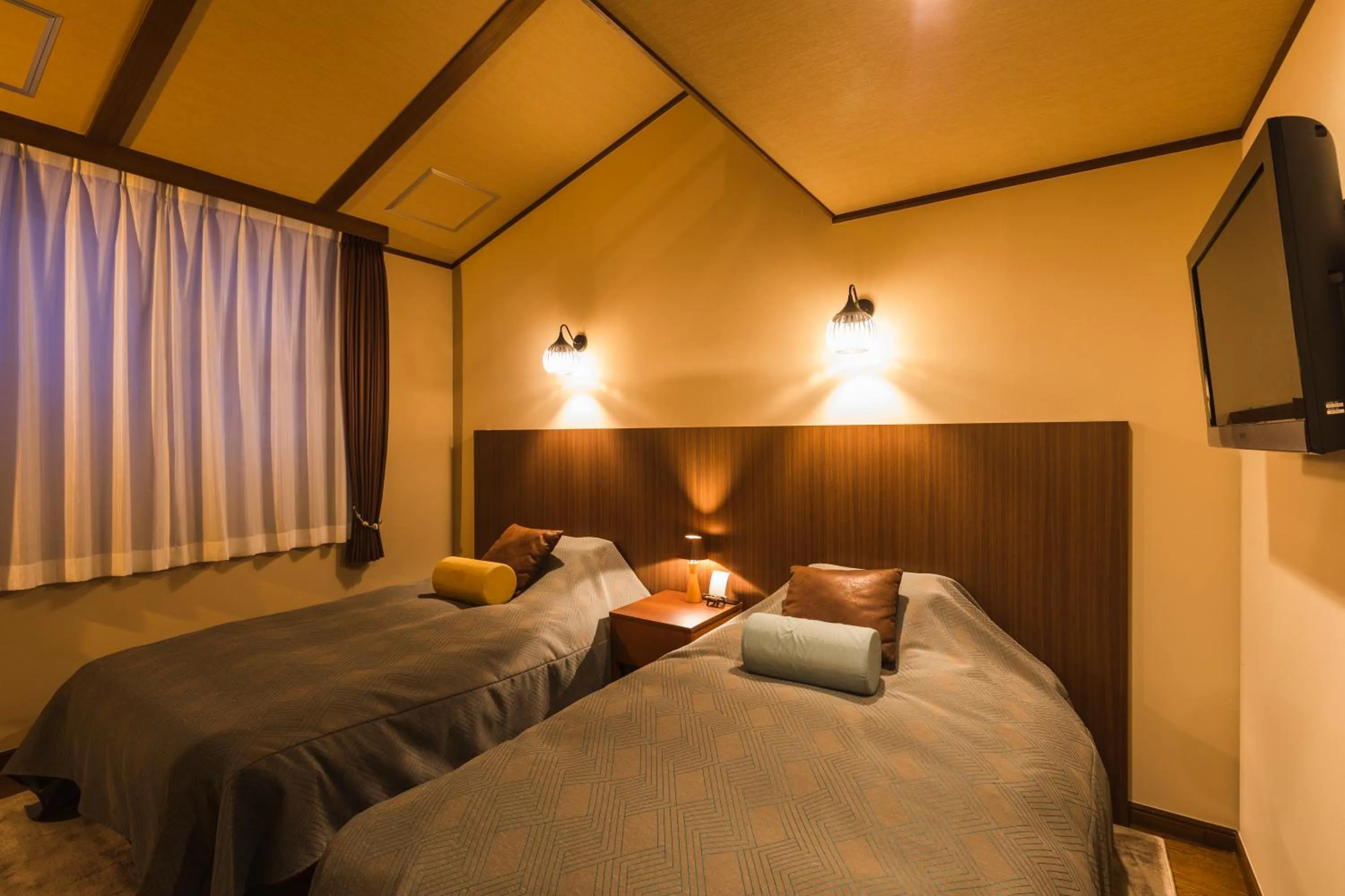 Bed in Hotel Jogakura