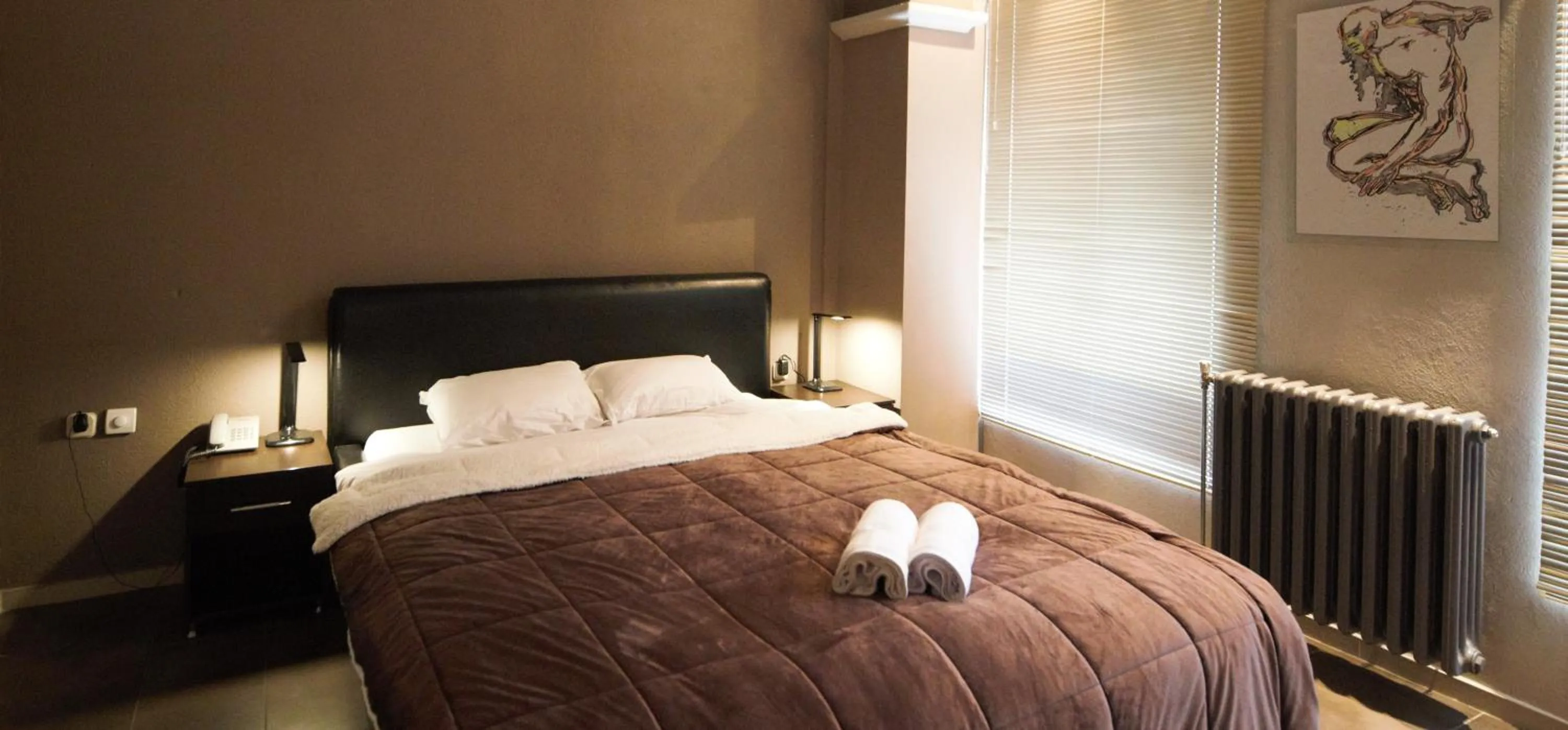 Bed in Hotel Ambasador