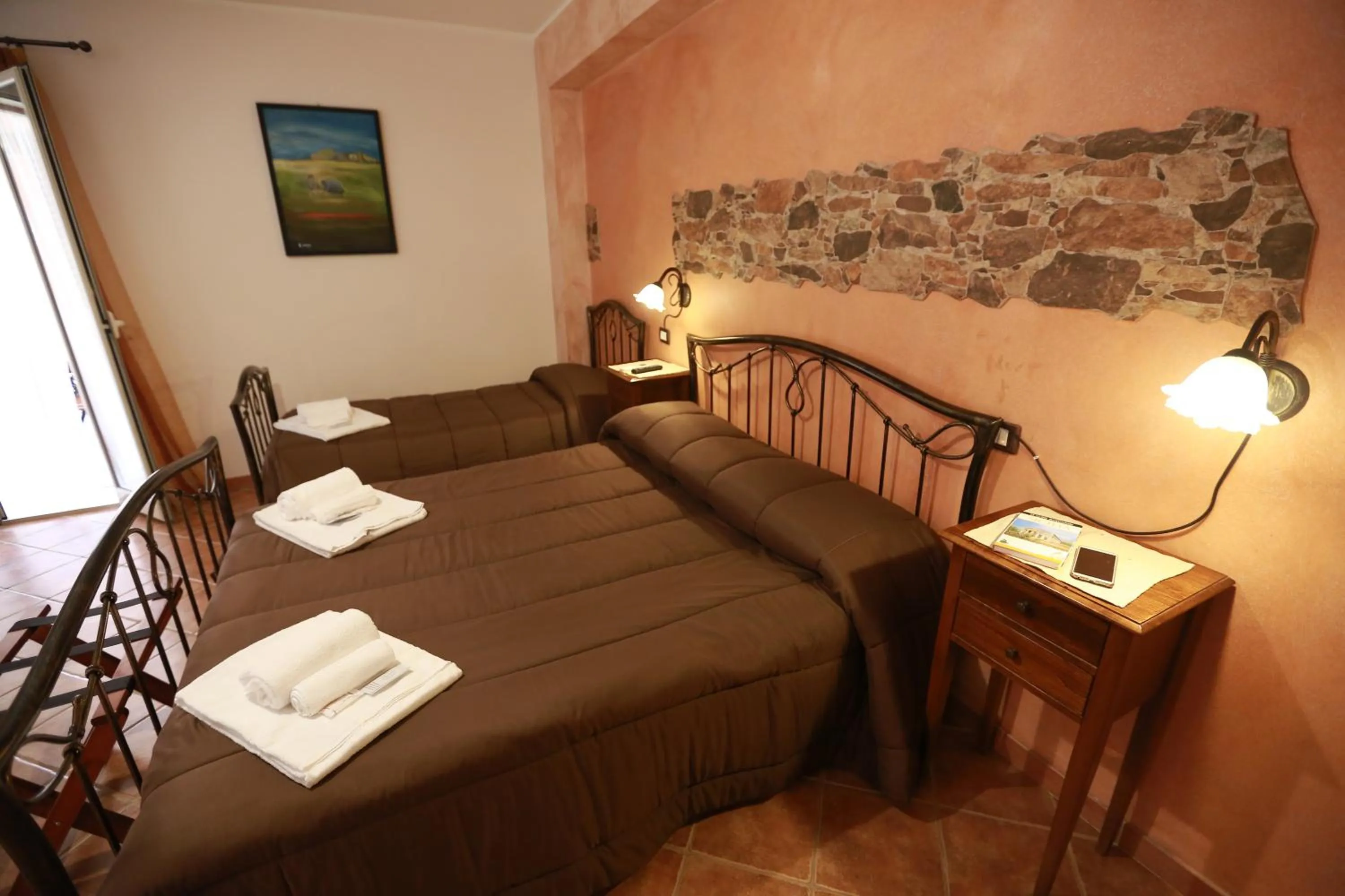 Bed in Sikania Suite