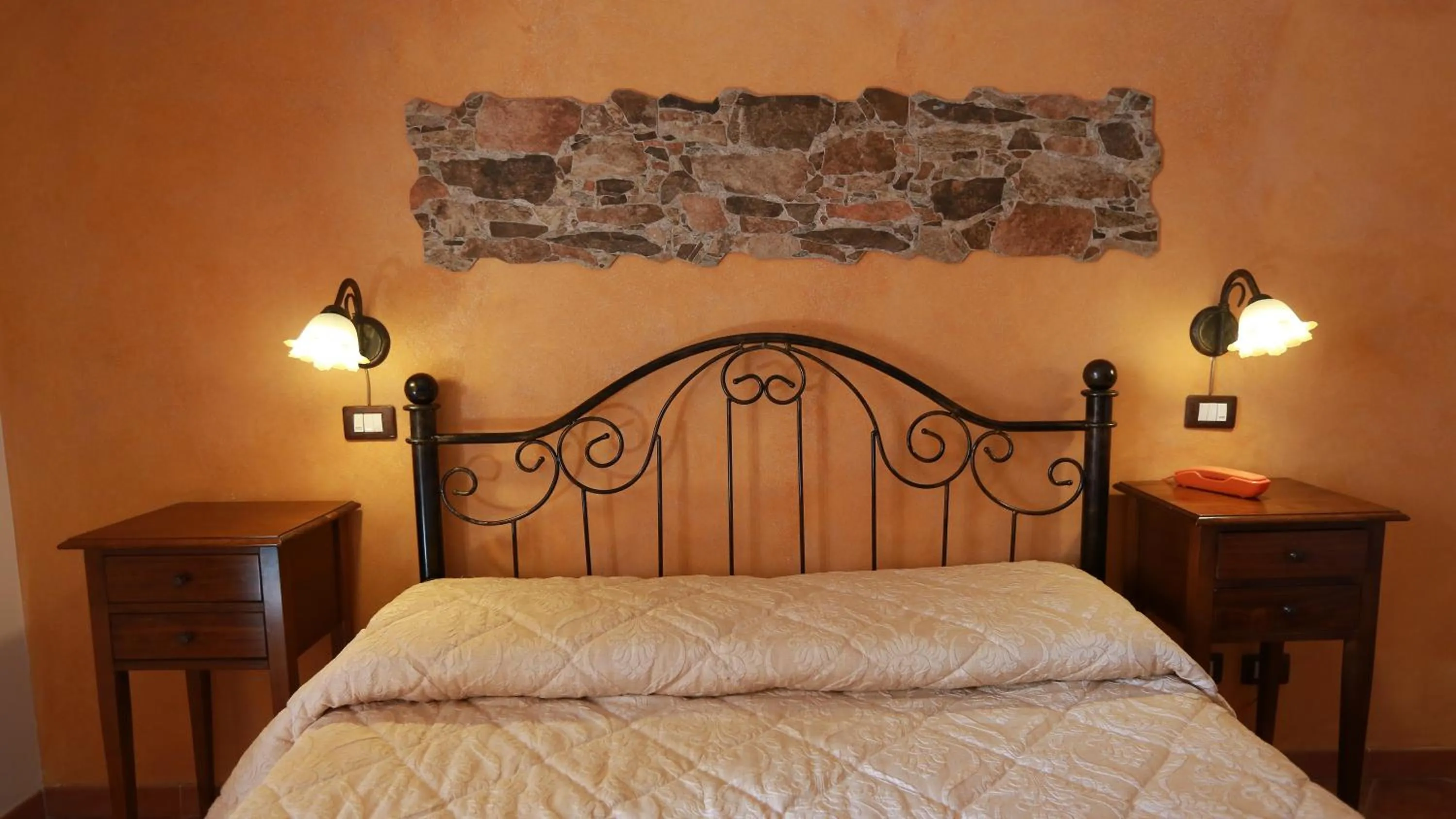 Bed in Sikania Suite