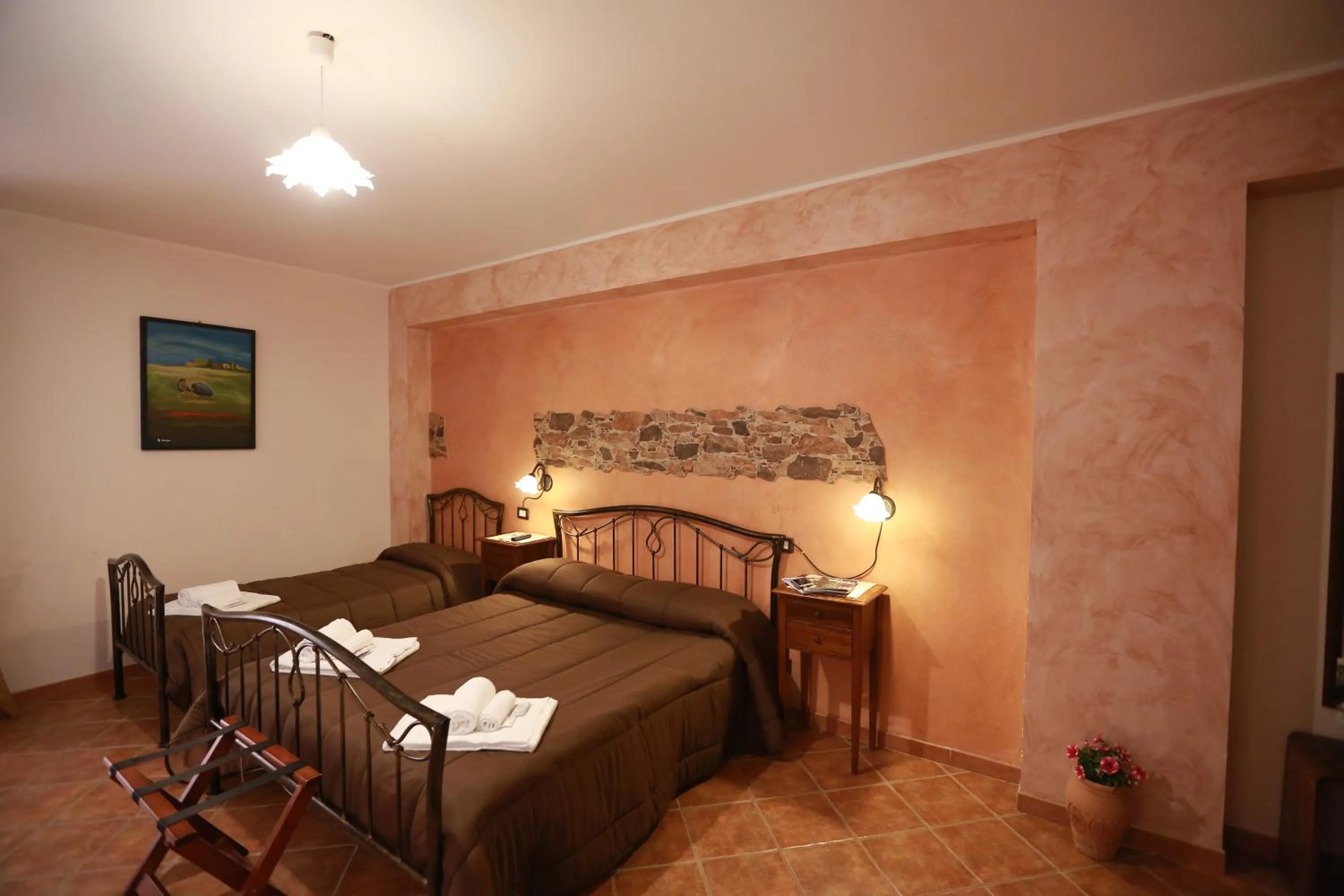 Bed in Sikania Suite