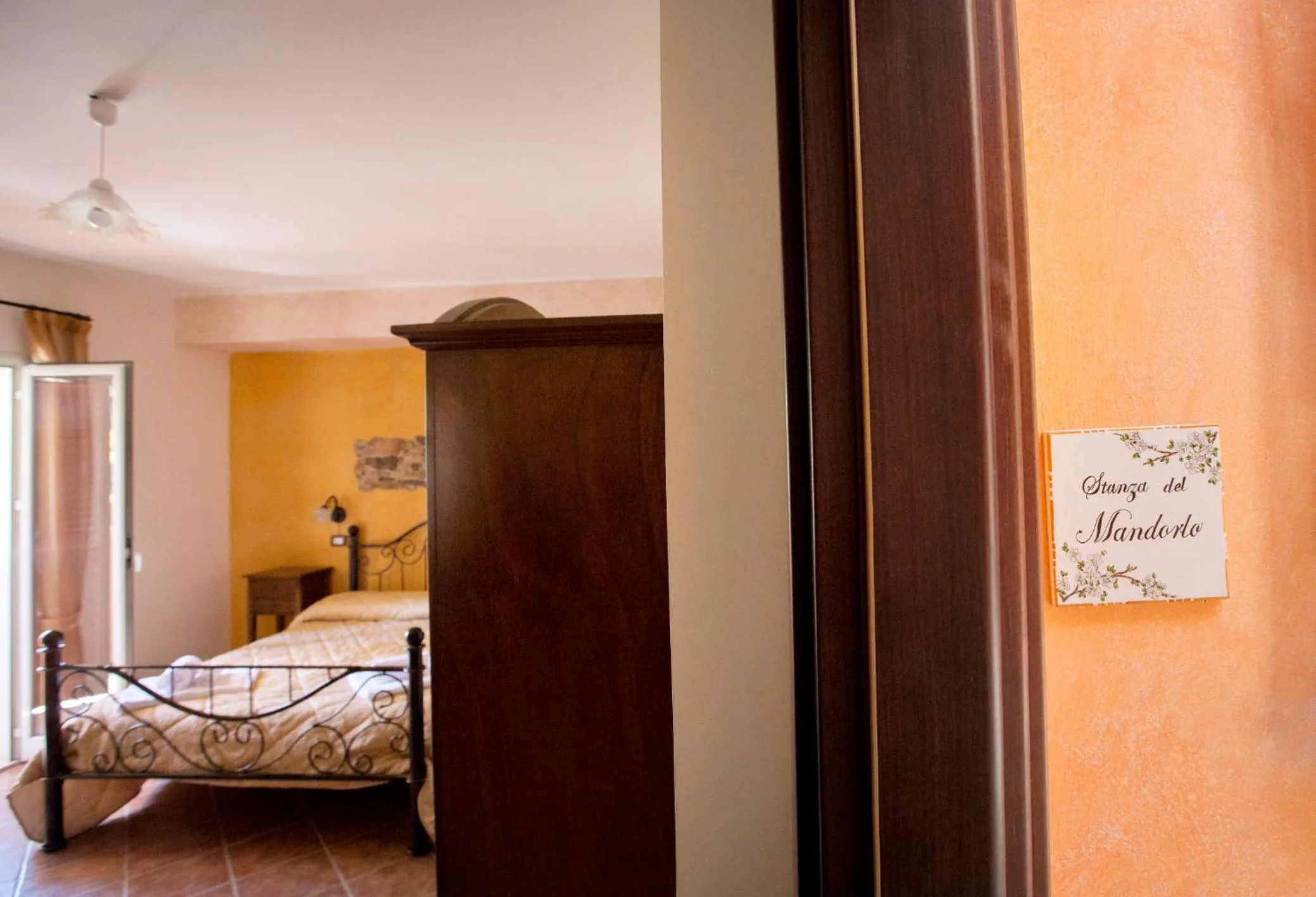 Bed in Sikania Suite