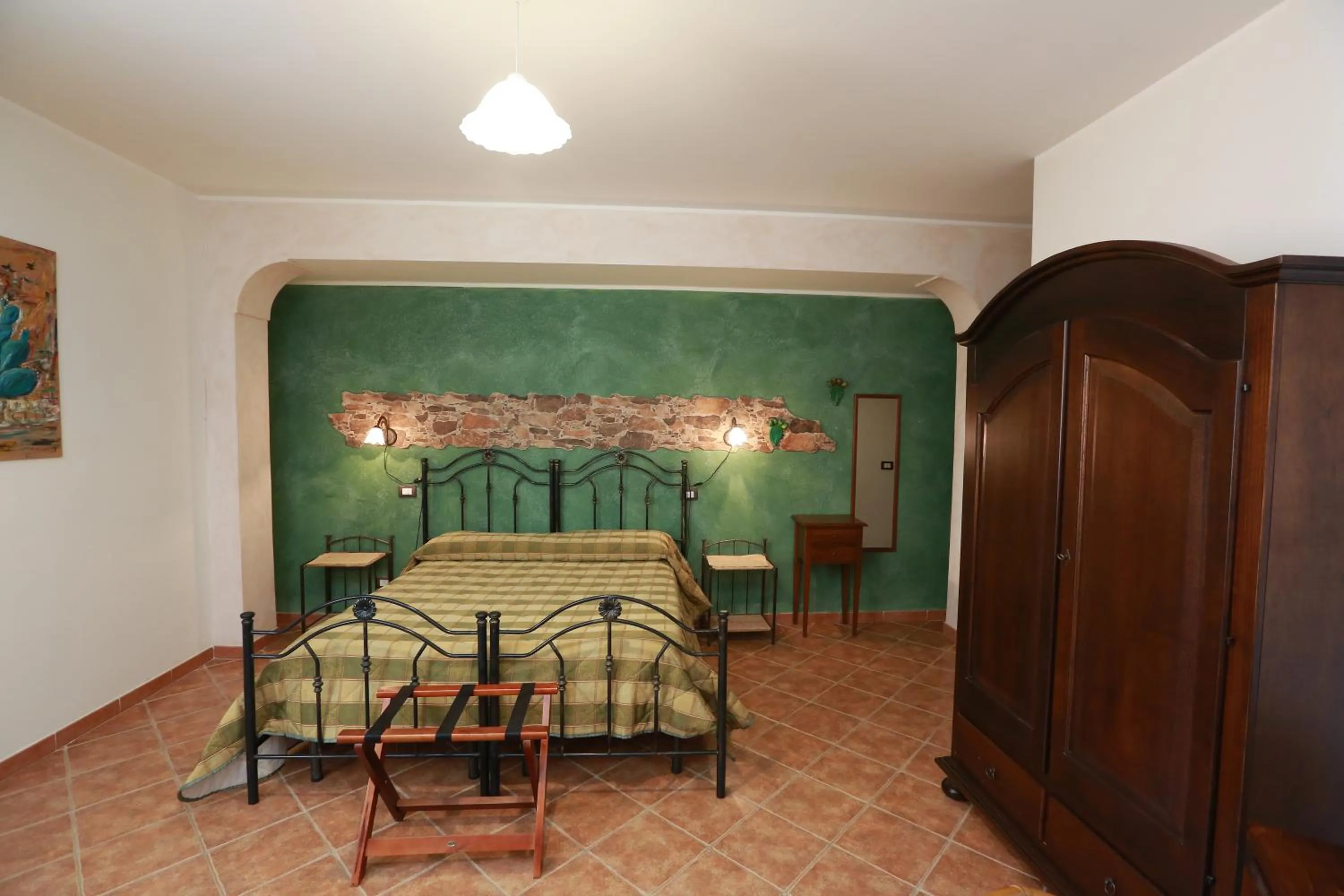 Bed in Sikania Suite