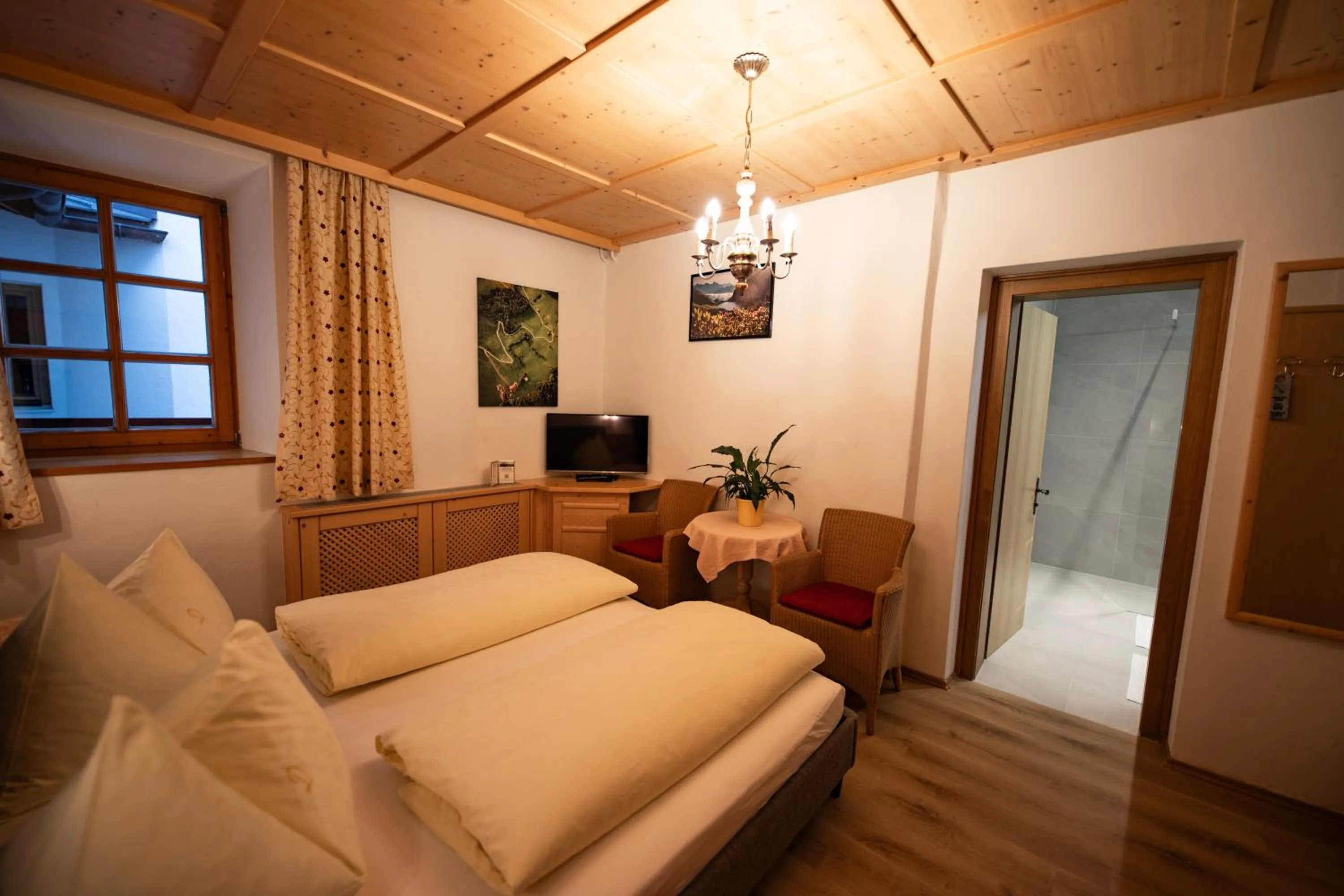 Bed in Dandler - Zimmer und Ferienwohnungen