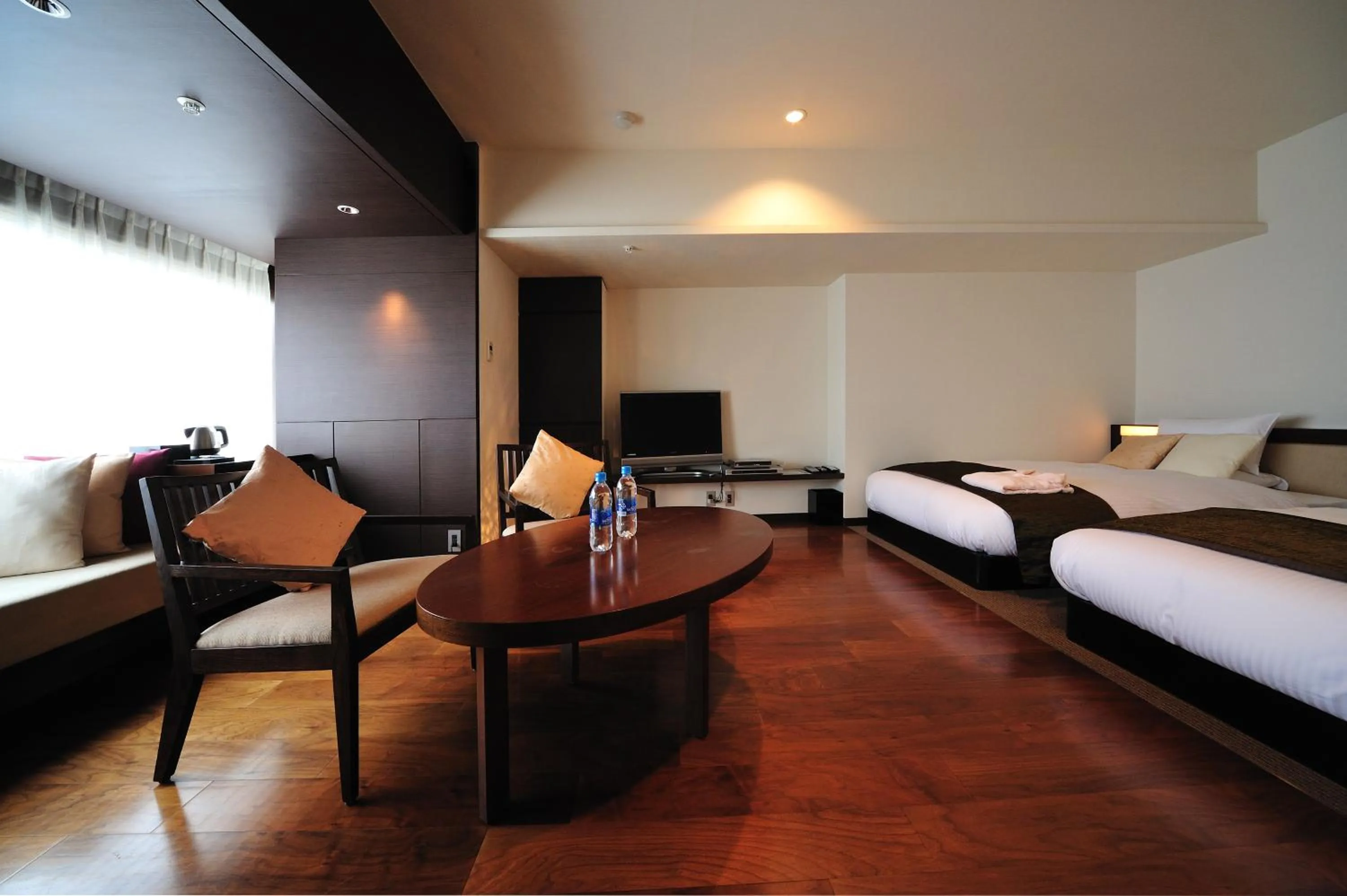 Bed, Seating Area in Hotel Micuras