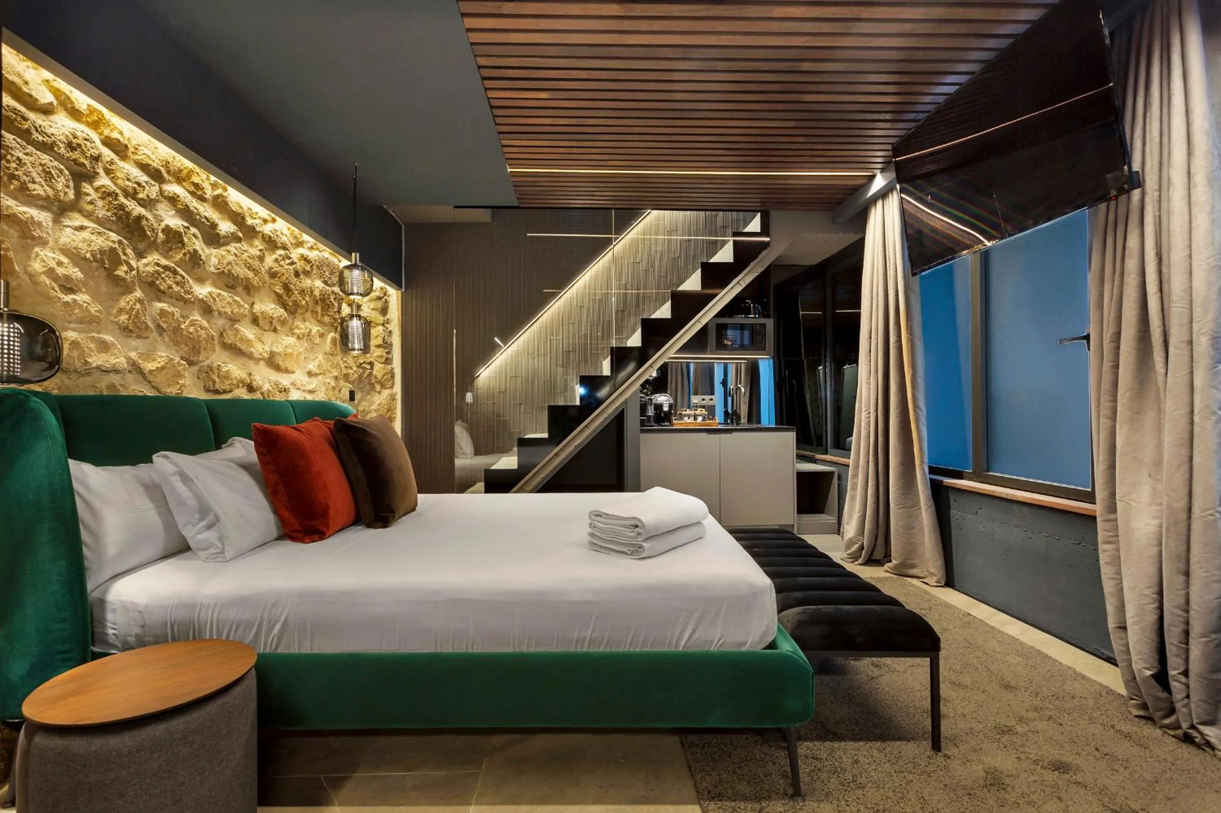 Bed in Apartaestudios Evolution Luxury