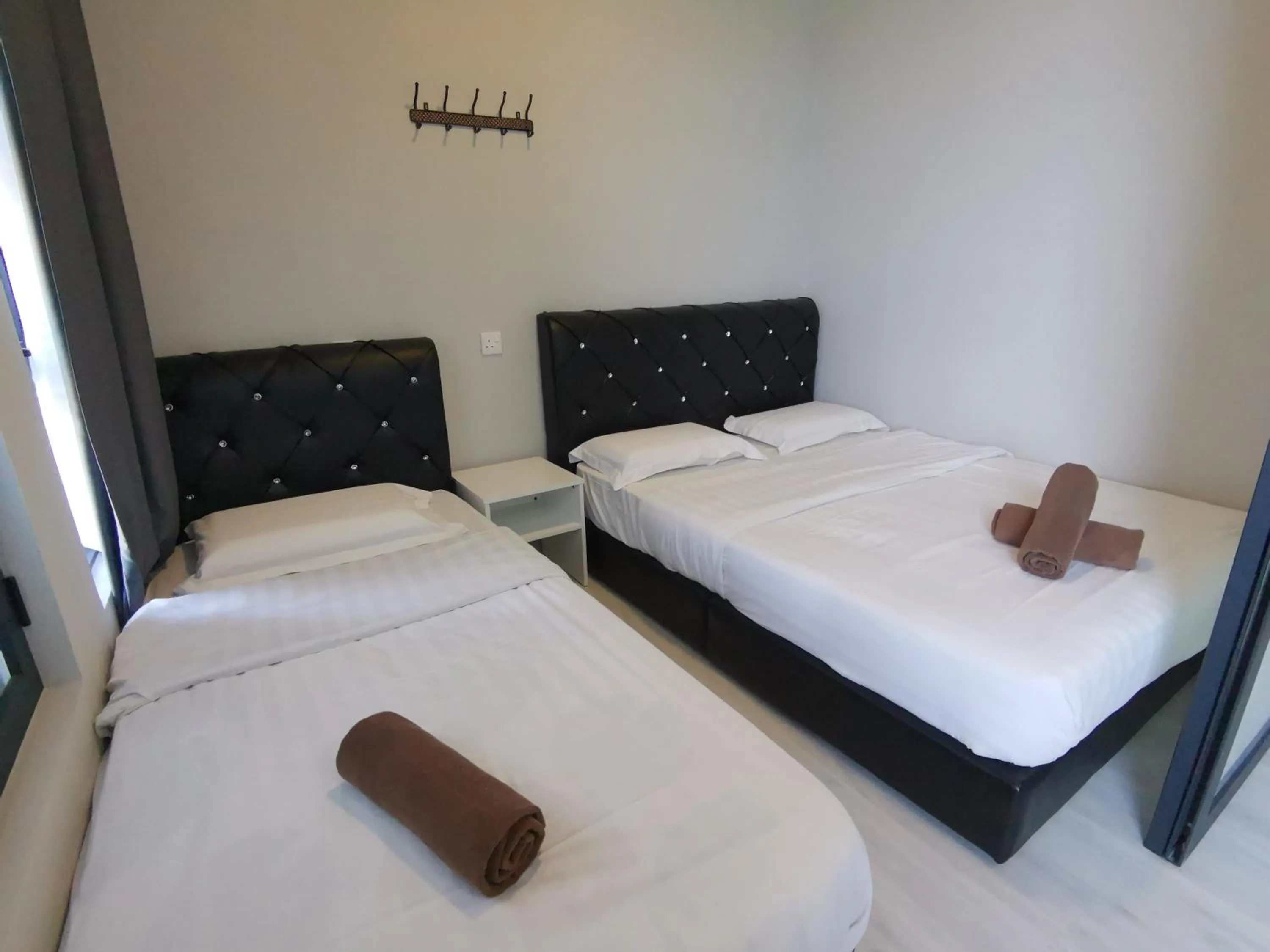 Bed in Jesselton Quay Citypads
