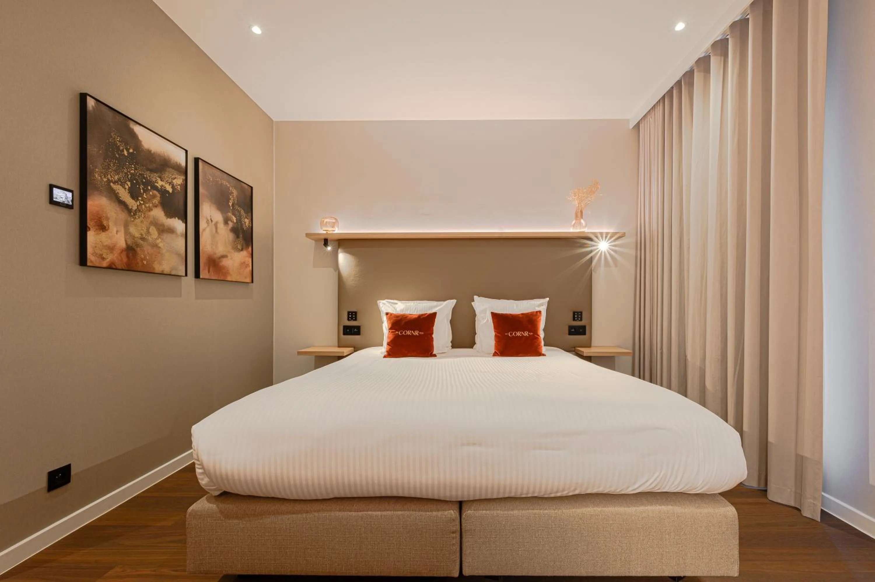 Bed in The CORNR Hotel