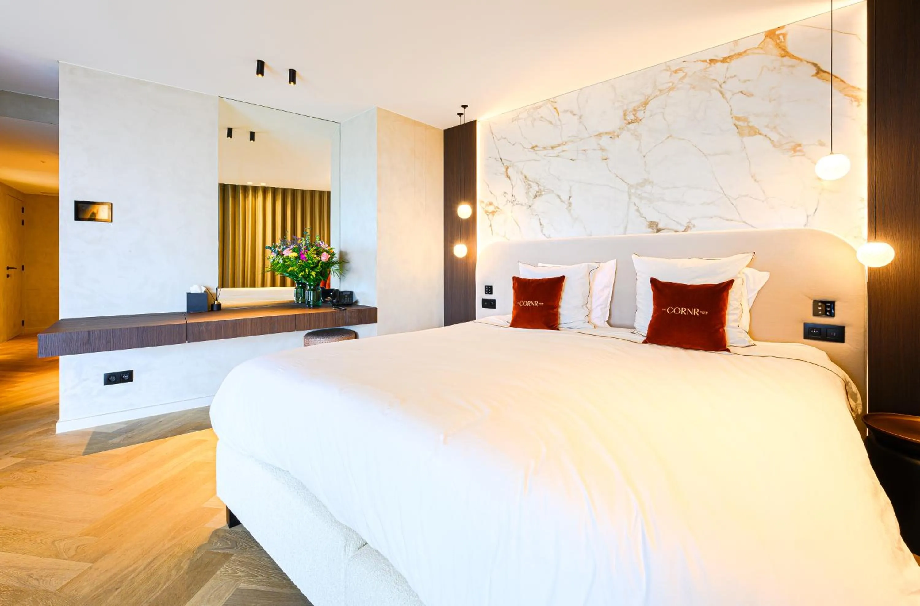 Bed in The CORNR Hotel