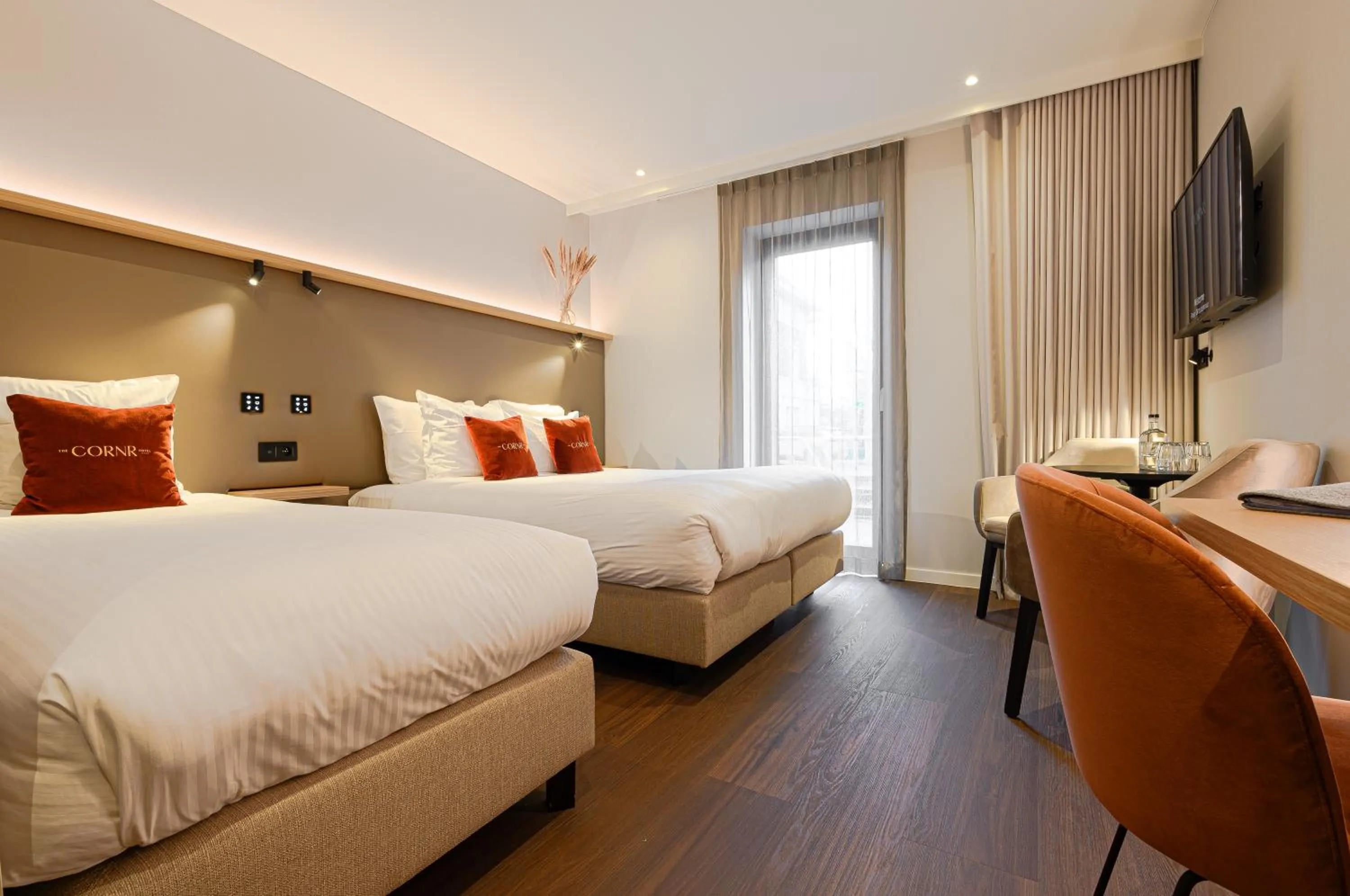 Bed in The CORNR Hotel