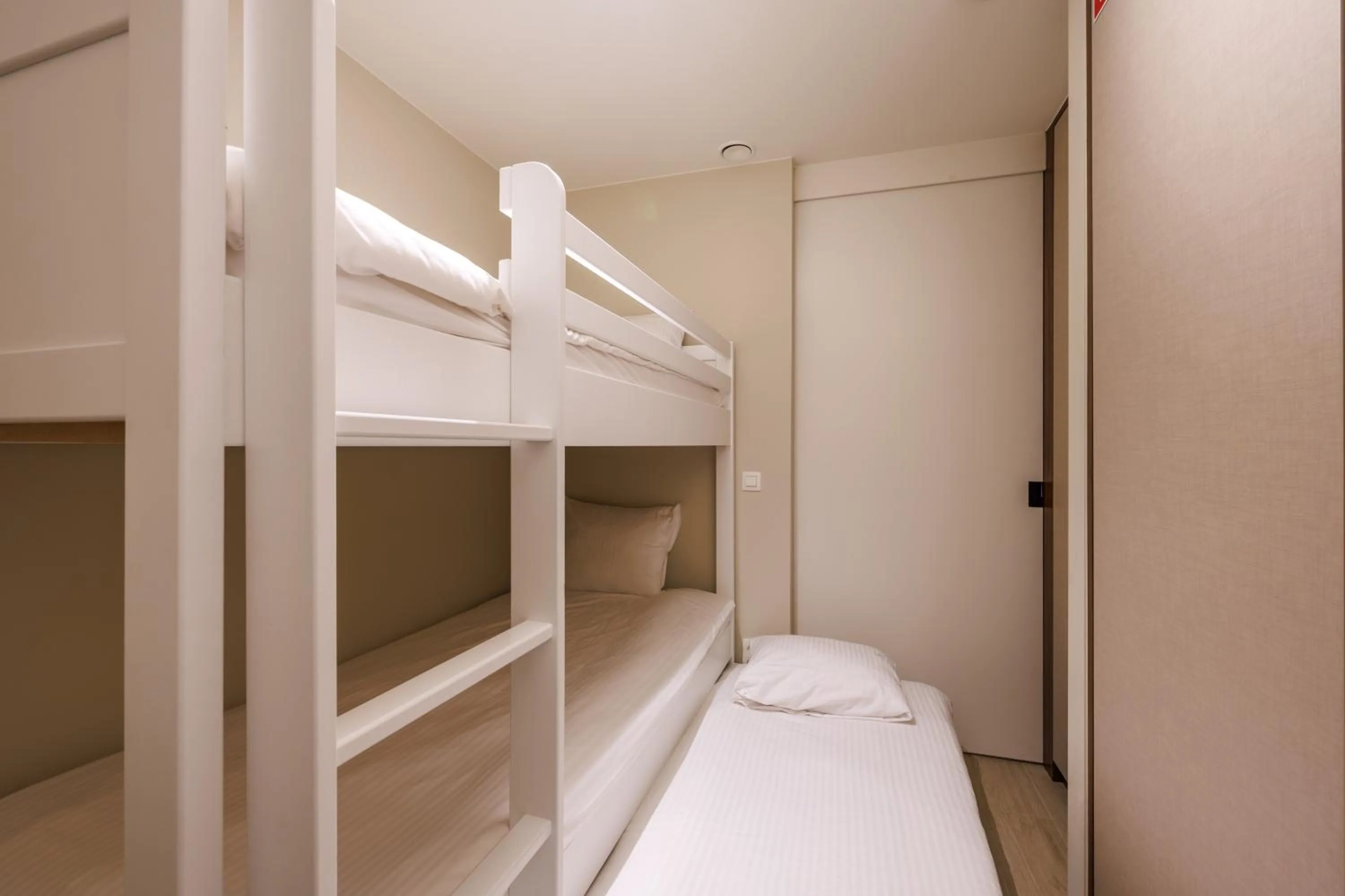 Bed in The CORNR Hotel