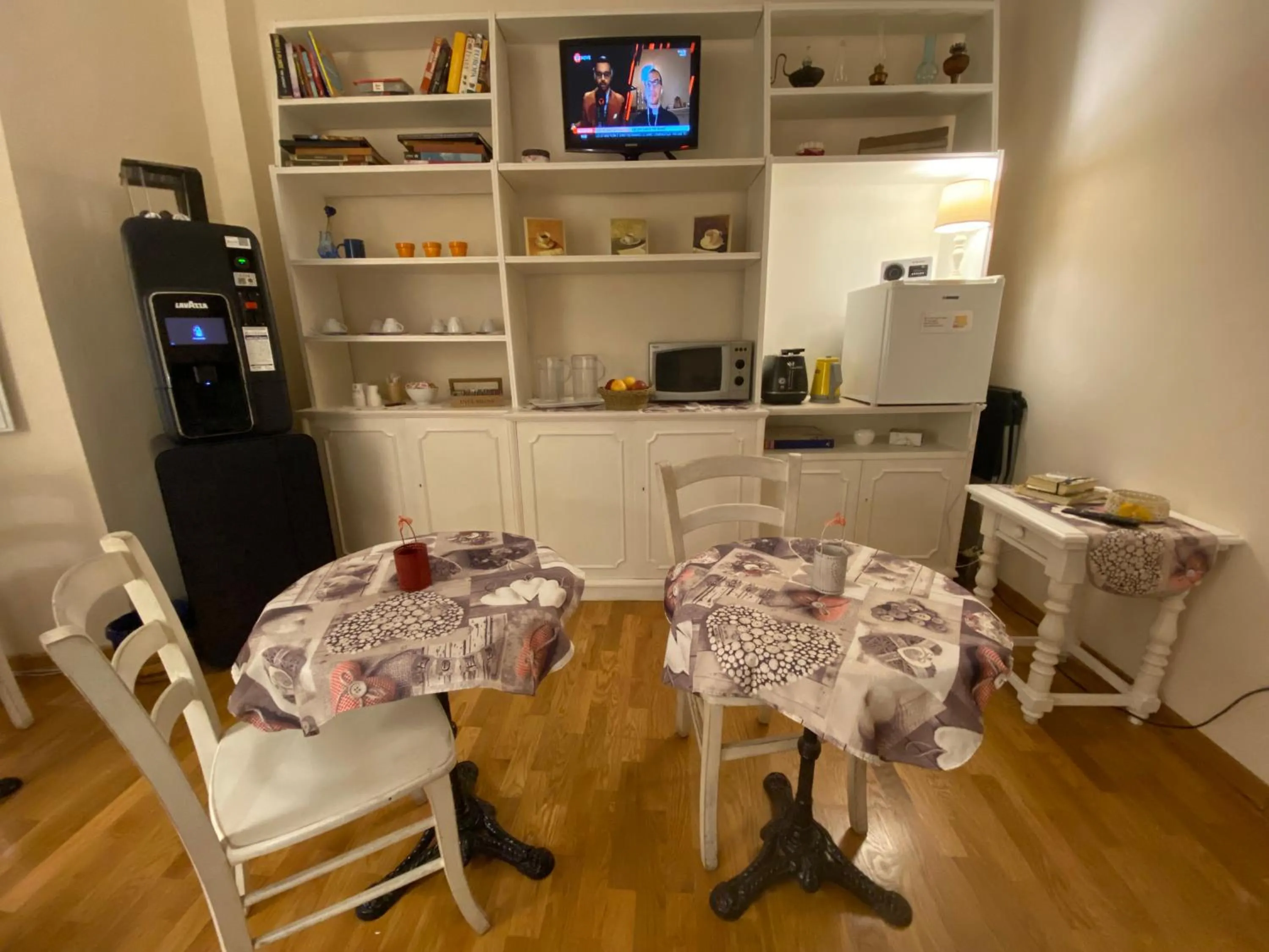 Communal lounge/ TV room in Relais Del Duomo