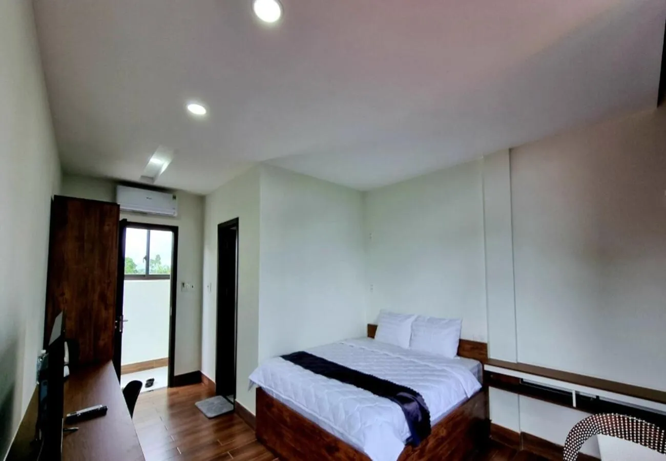 Photo of the whole room, Bed in Golden Star Villa Hue