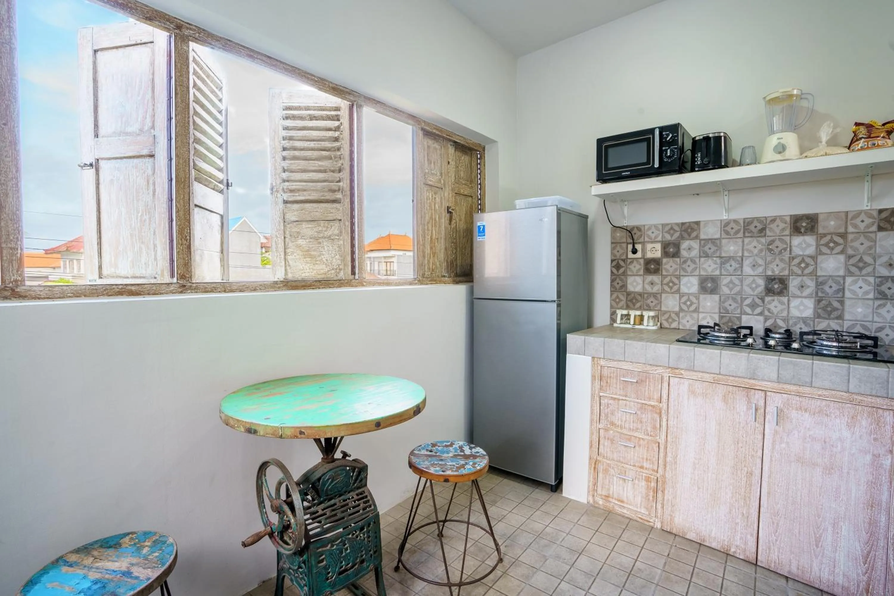 Kitchen or kitchenette in Malam Hari ApartHotel