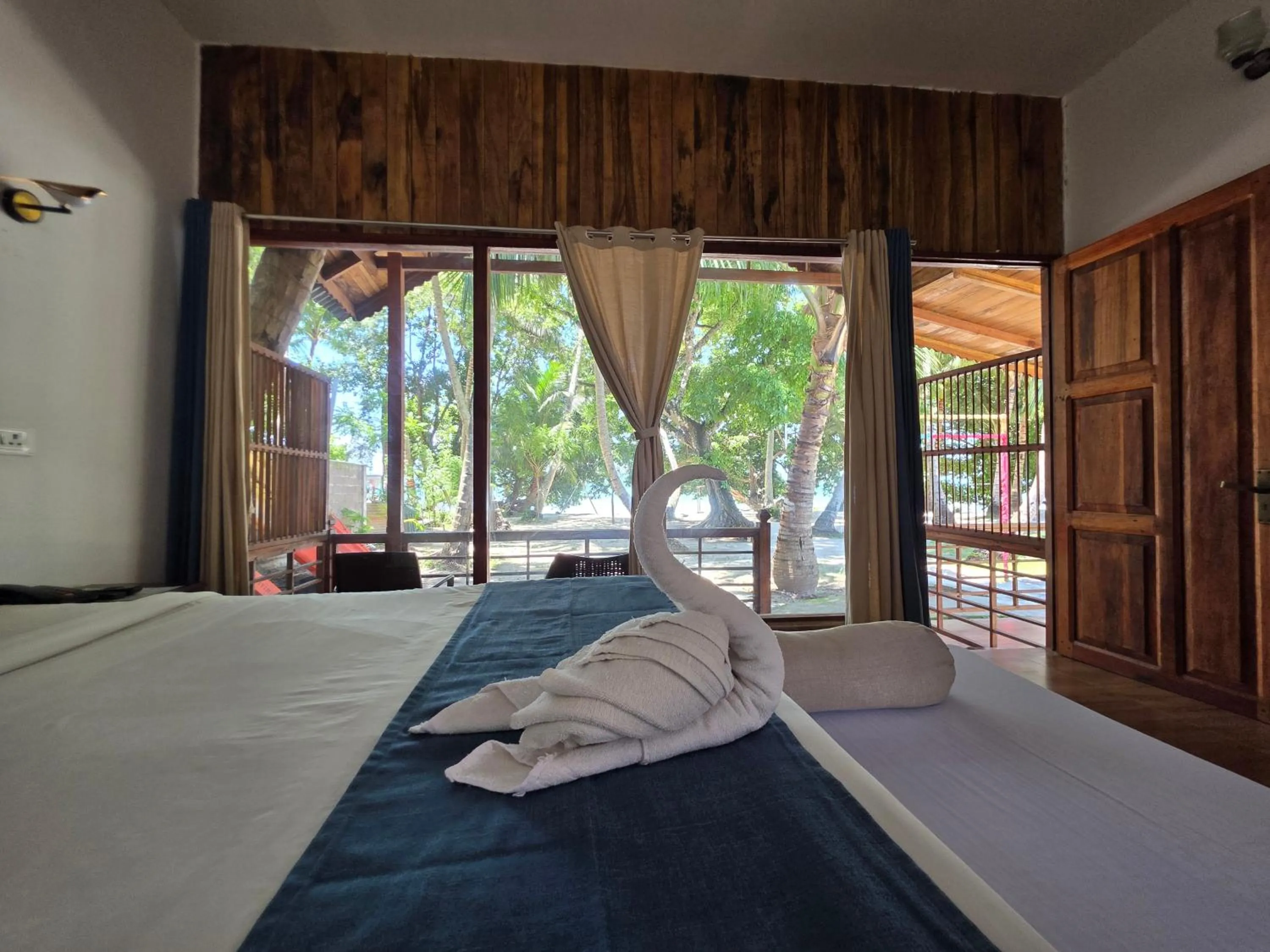 Bed in Lemon Grass Resort & Spa