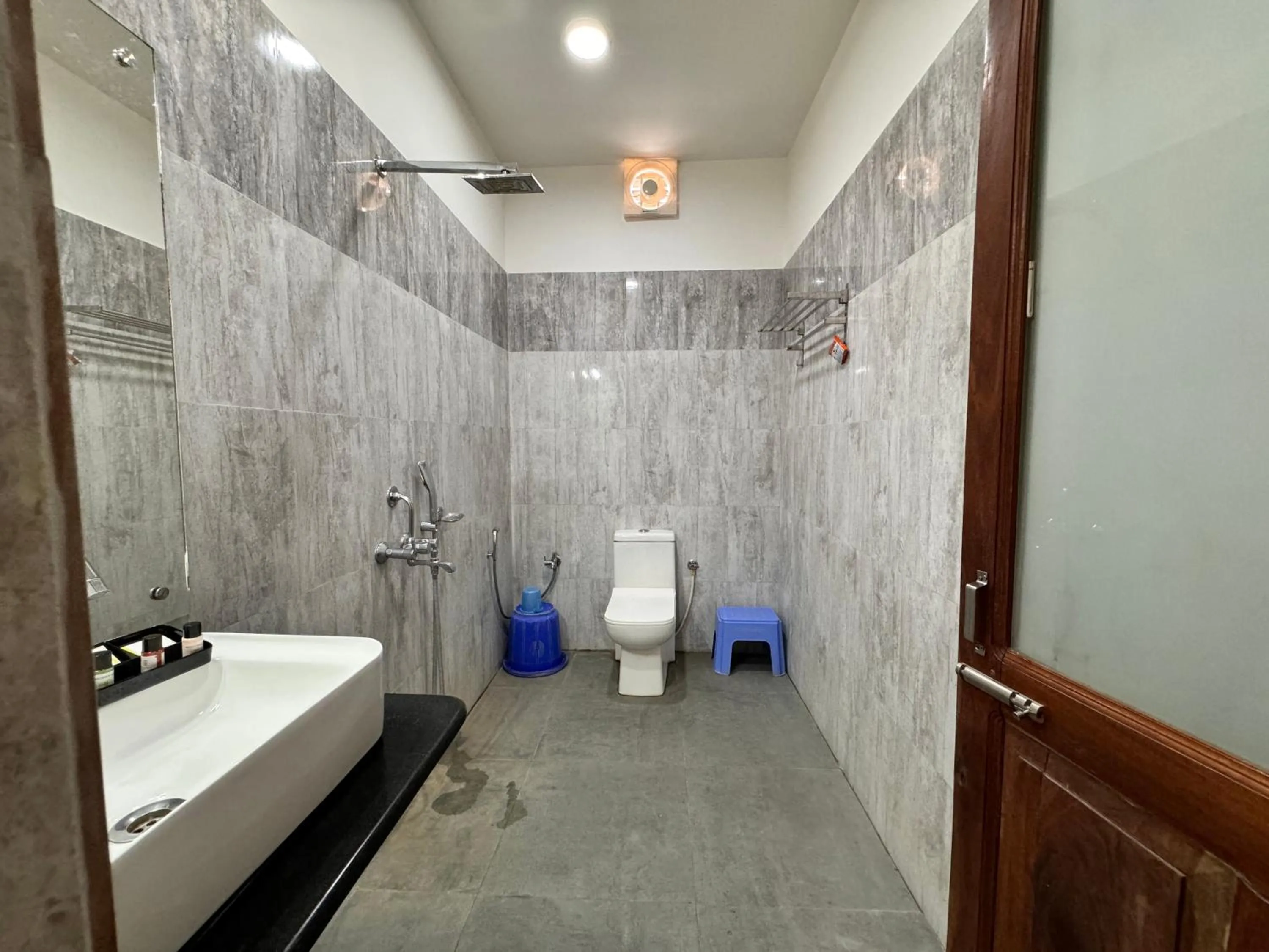 Toilet in Lemon Grass Resort & Spa