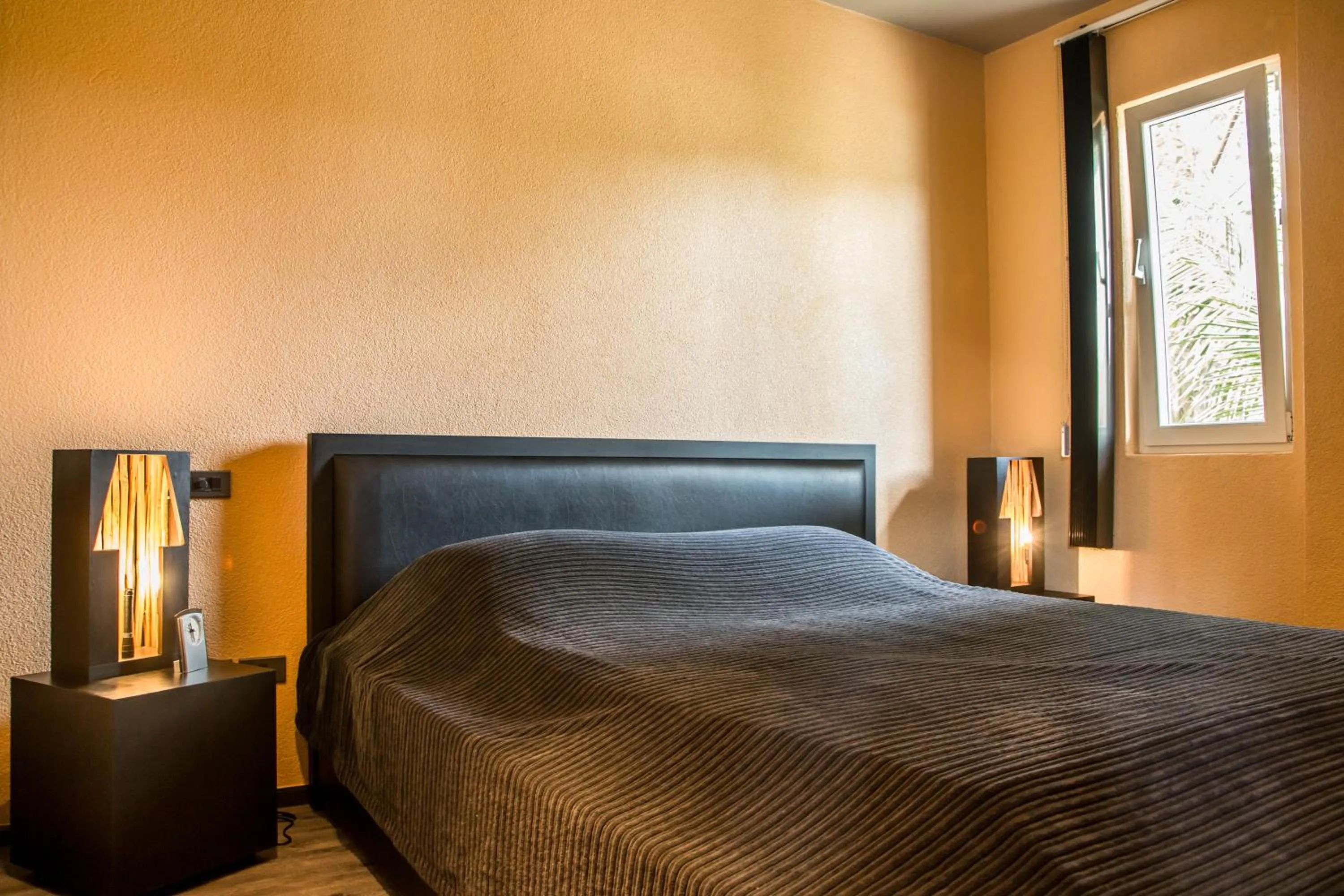 Bed in Shambhala Beach Resort