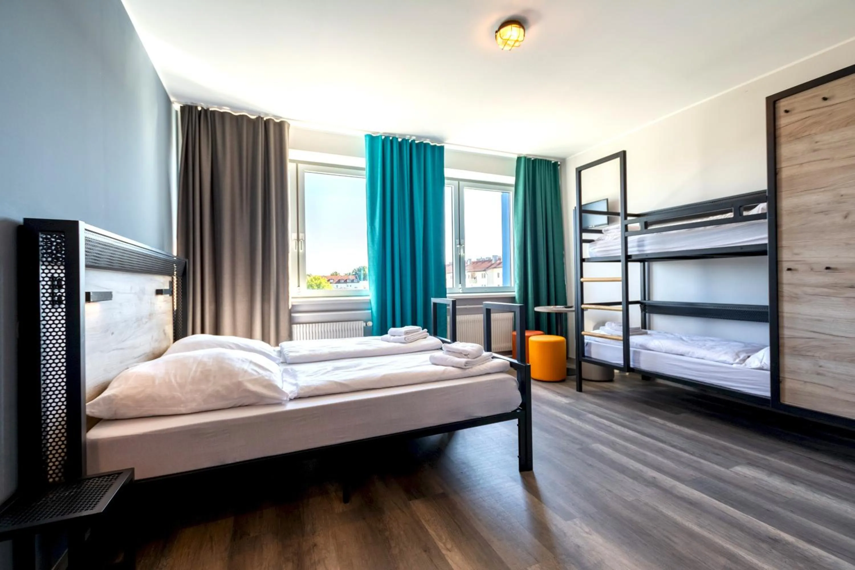 Photo of the whole room, Bed in a&o München Laim