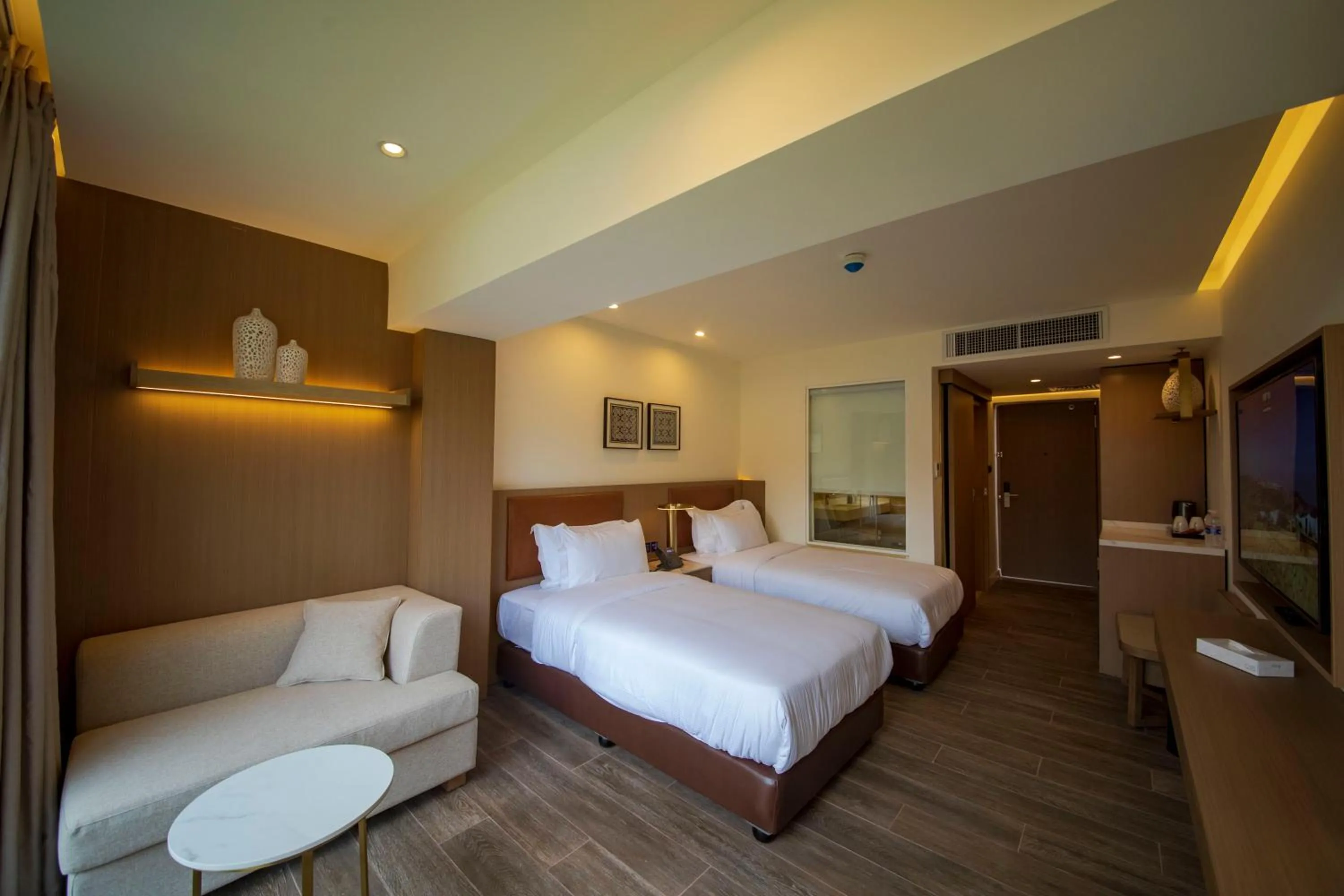 Photo of the whole room, Bed in Luxotel Aqaba Beach Resort & Spa Only 15 years plus