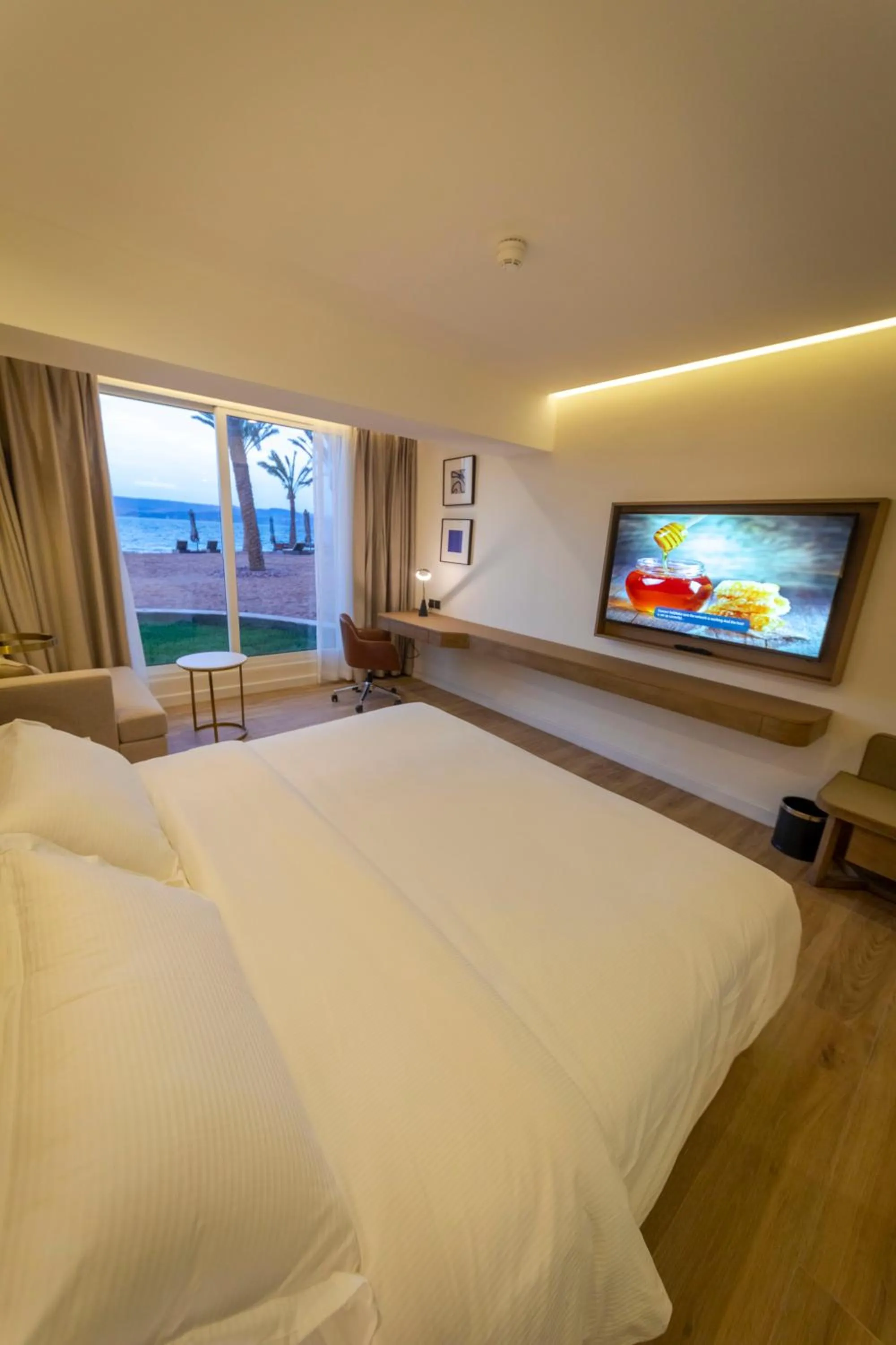 Bedroom, Bed in Luxotel Aqaba Beach Resort & Spa Only 15 years plus