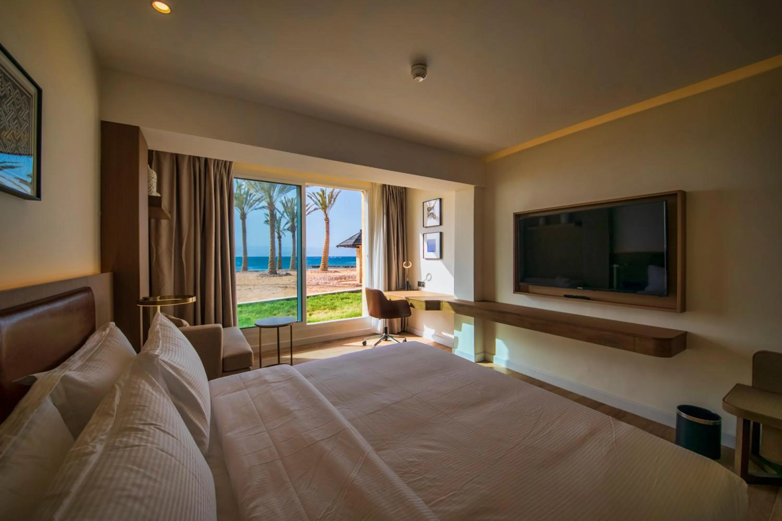 Photo of the whole room, Bed in Luxotel Aqaba Beach Resort & Spa Only 15 years plus