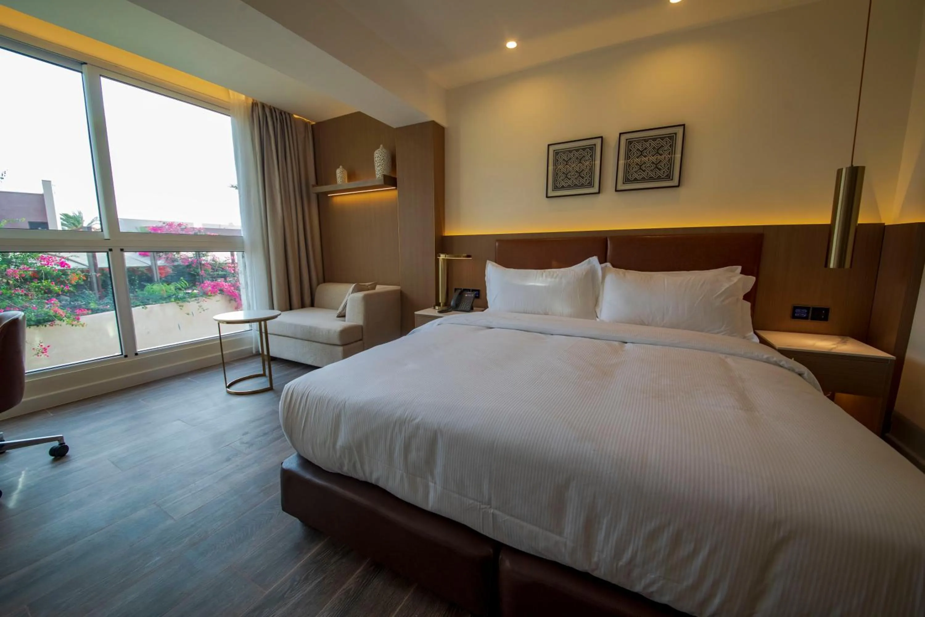 Bedroom, Bed in Luxotel Aqaba Beach Resort & Spa Only 15 years plus